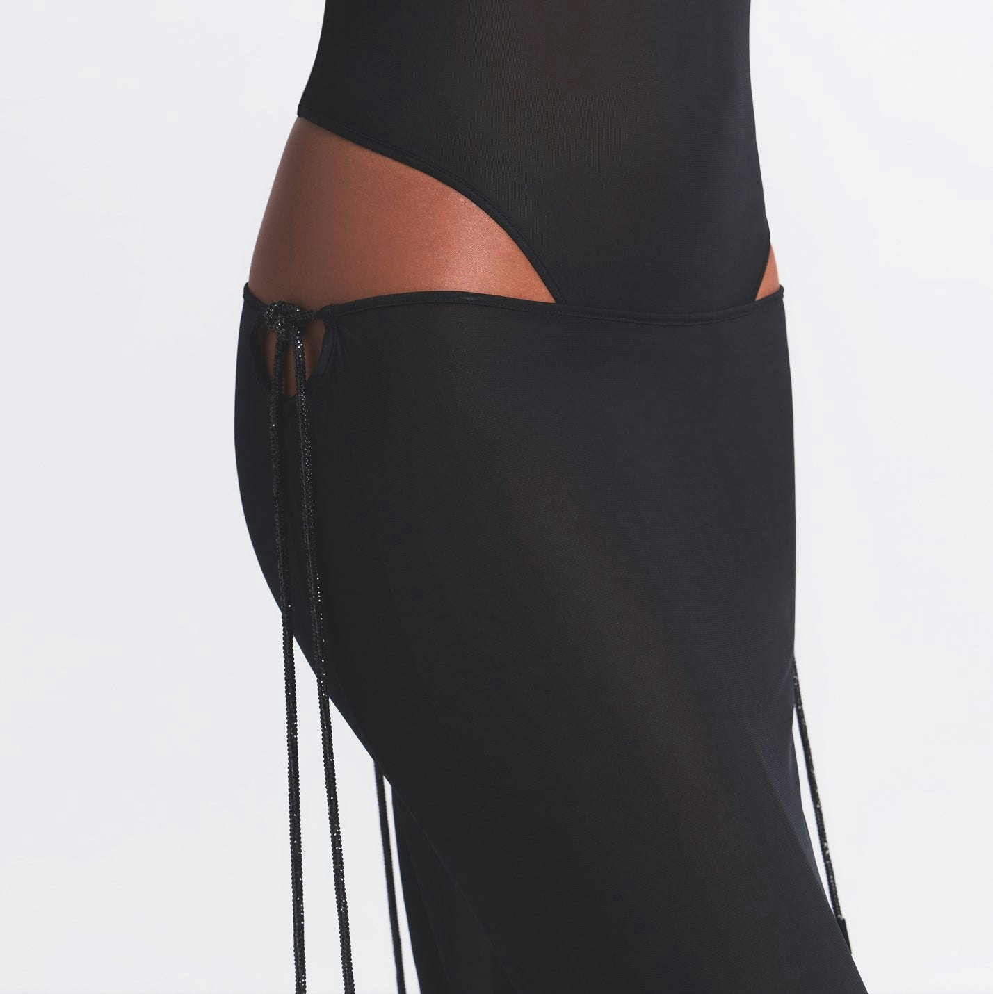 RHINESTONE KNIT TIE SIDE MIDI SKIRT | ONYX ON A MODEL SIDE VIEW @ | FOCUS: 0.0, 1.0, 0.9