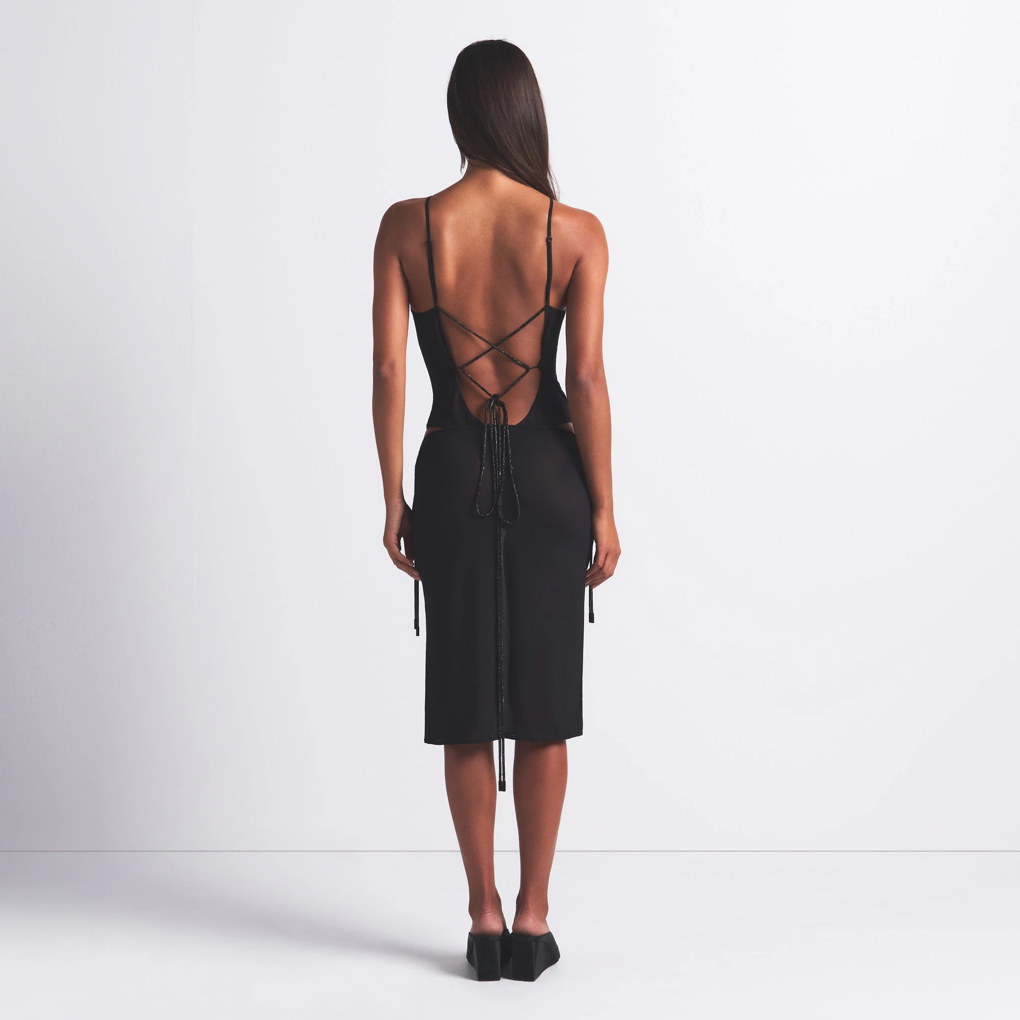 RHINESTONE KNIT TIE SIDE MIDI SKIRT | ONYX ON A MODEL FRONT VIEW @ | FOCUS: 0.0, 1.0, 0.9