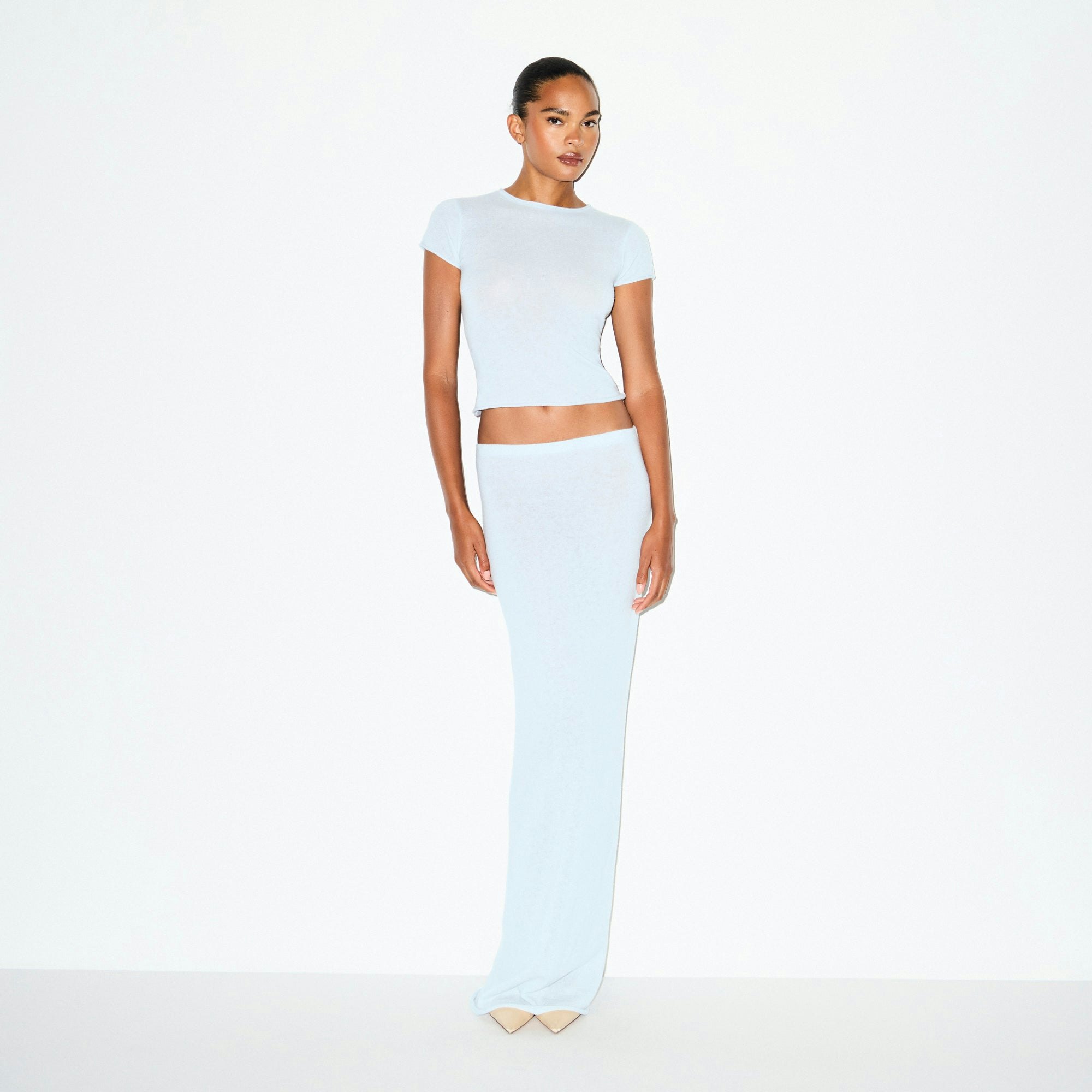 FEATHERWEIGHT CASHMERE LONG SKIRT | PEARL ON A MODEL FRONT VIEW @ | FOCUS: 0.0, 1.0, 0.9