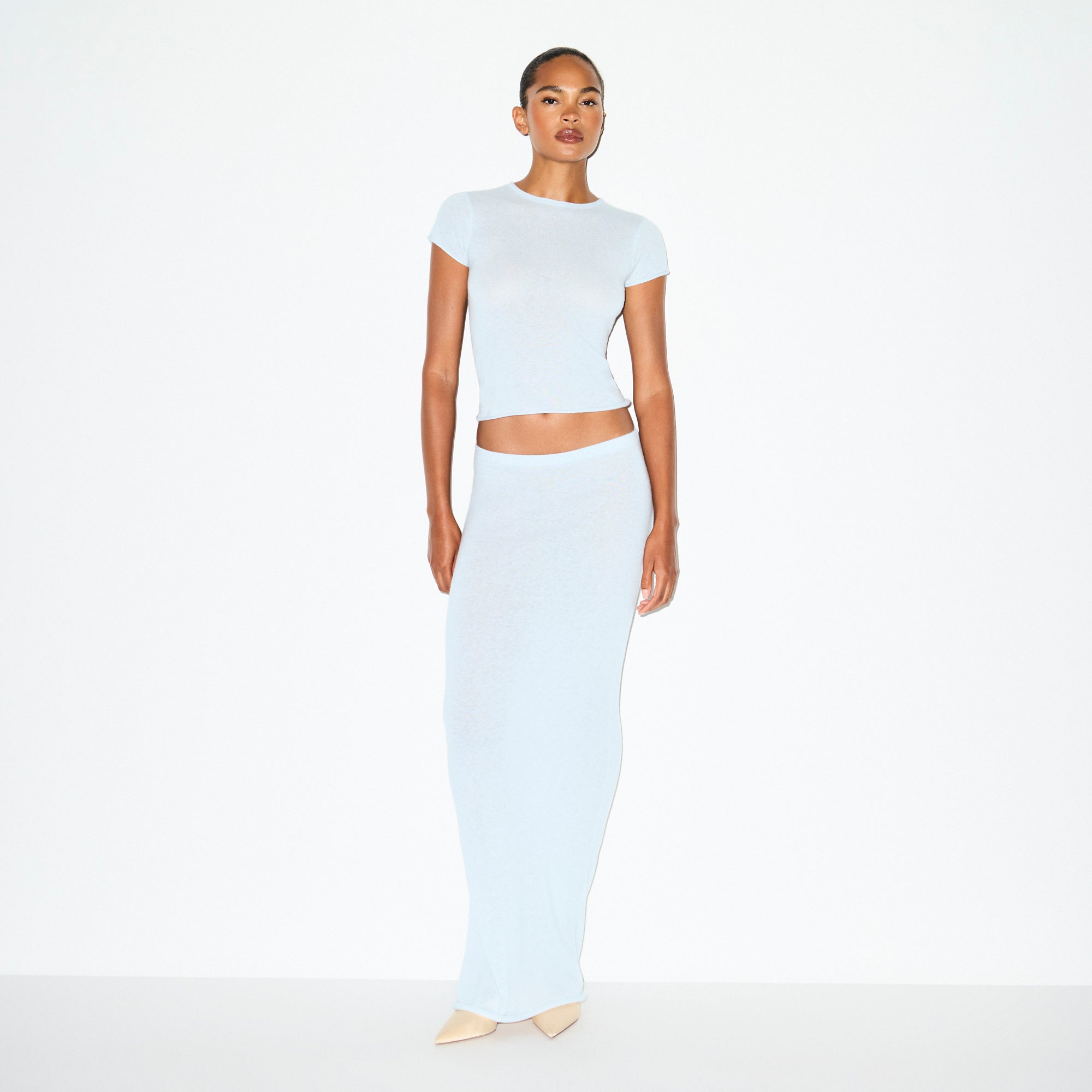FEATHERWEIGHT CASHMERE LONG SKIRT | PEARL ON A MODEL FRONT VIEW @ | FOCUS: 0.0, 1.0, 0.9