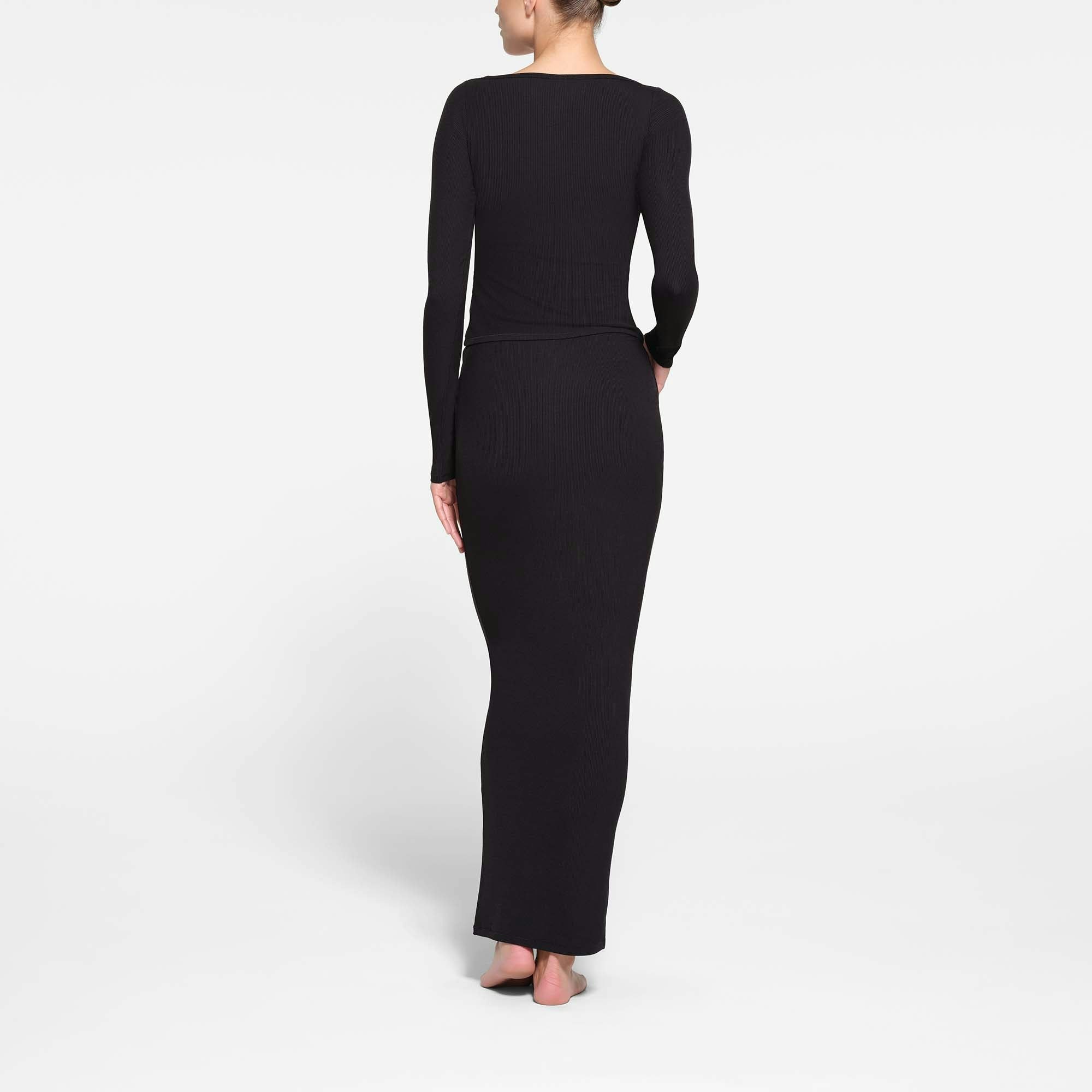 SOFT LOUNGE LONG SKIRT | ONYX ON A MODEL BACK VIEW @ | FOCUS: 0.9, 0.1, 