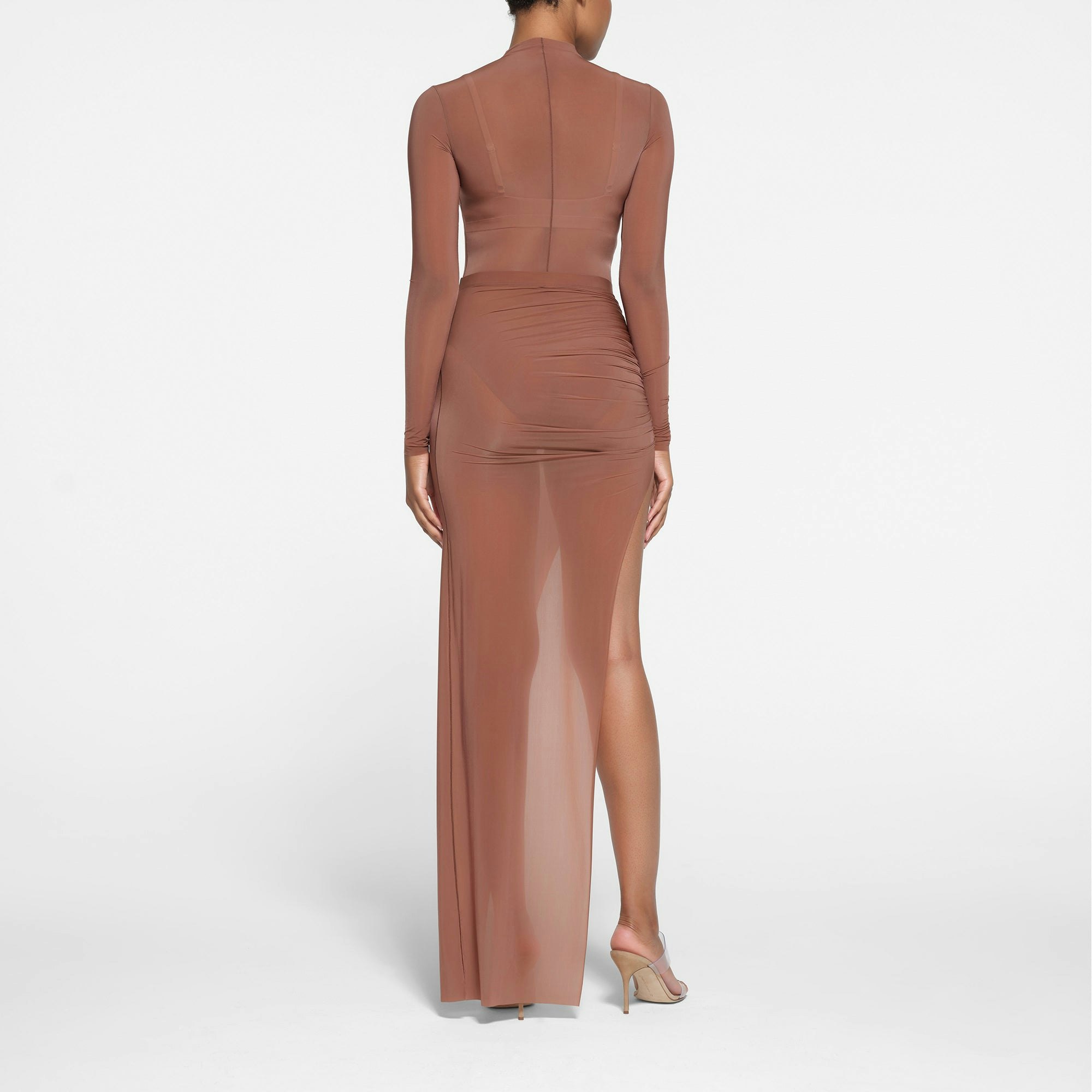 MILKY SHEER LONG TUBE SKIRT | BRANDY ON A MODEL BACK VIEW