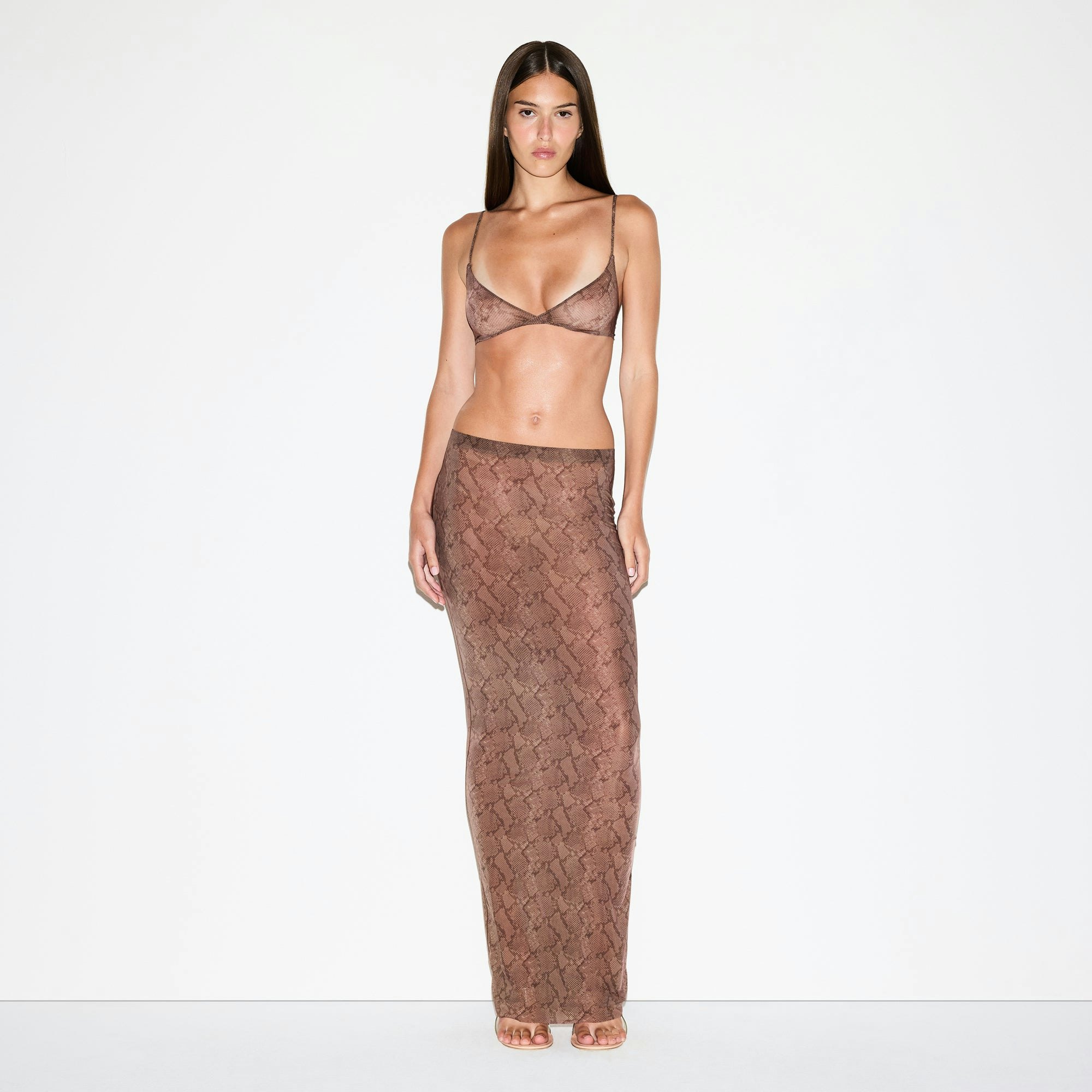 MILKY SHEER LONG SKIRT | JASPER SNAKE PRINT ON A MODEL FRONT VIEW @ | FOCUS: 0.0, 1.0, 0.9