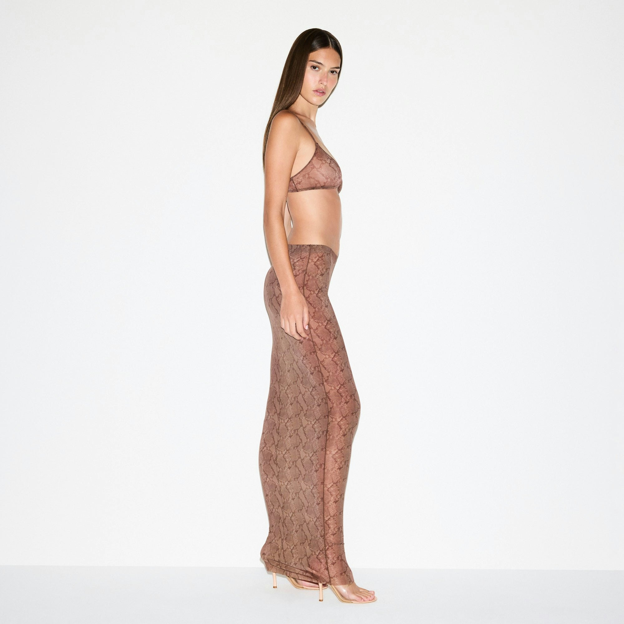MILKY SHEER LONG SKIRT | JASPER SNAKE PRINT ON A MODEL SIDE VIEW @ | FOCUS: 0.0, 1.0, 0.9