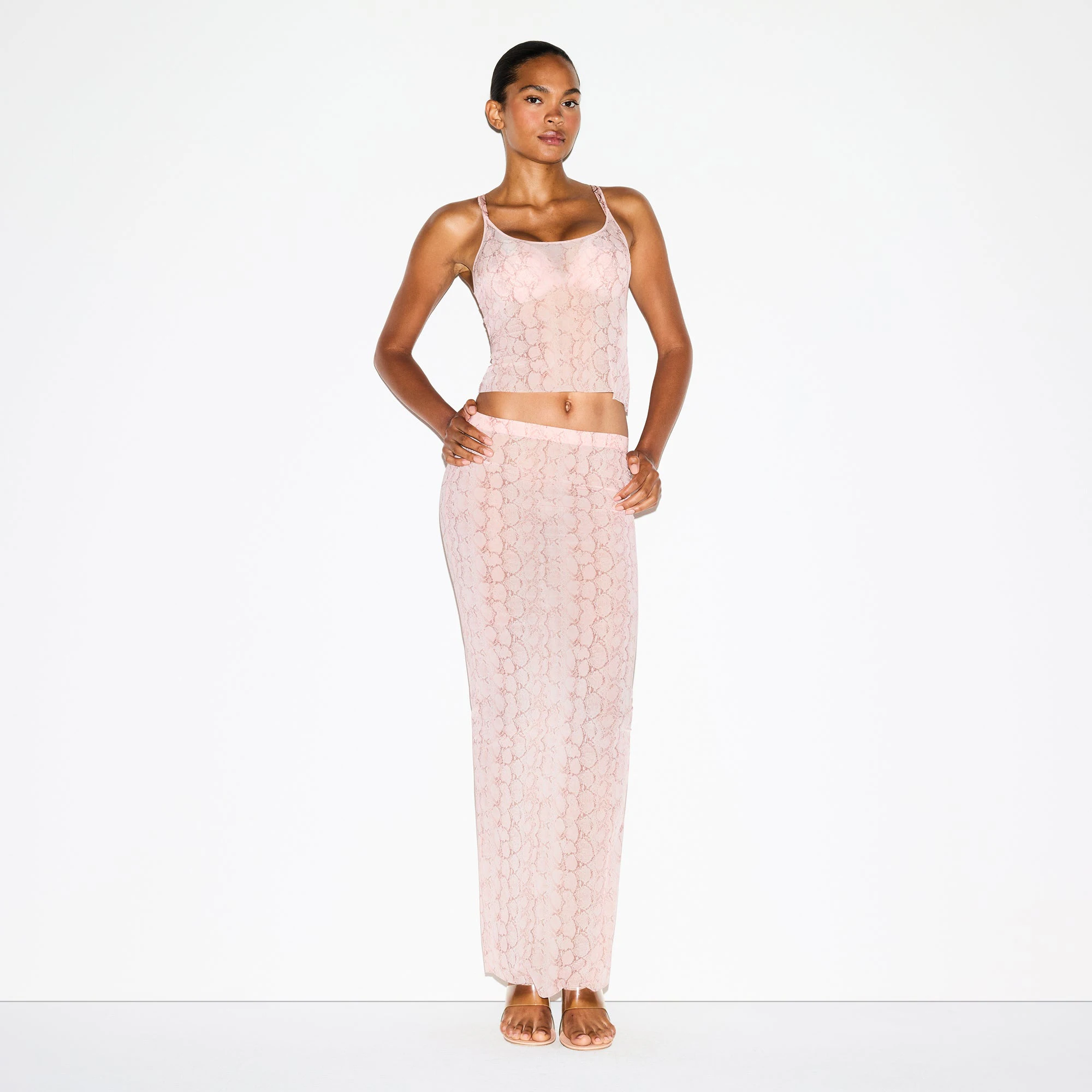 MILKY SHEER LONG SKIRT | ROSE PASTEL SNAKE PRINT ON A MODEL FRONT VIEW @ | FOCUS: 0.0, 1.0, 0.9