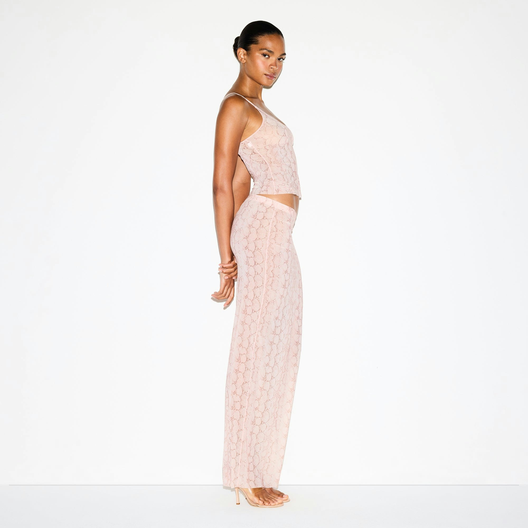 MILKY SHEER LONG SKIRT | ROSE PASTEL SNAKE PRINT ON A MODEL FRONT VIEW @ | FOCUS: 0.0, 1.0, 0.9