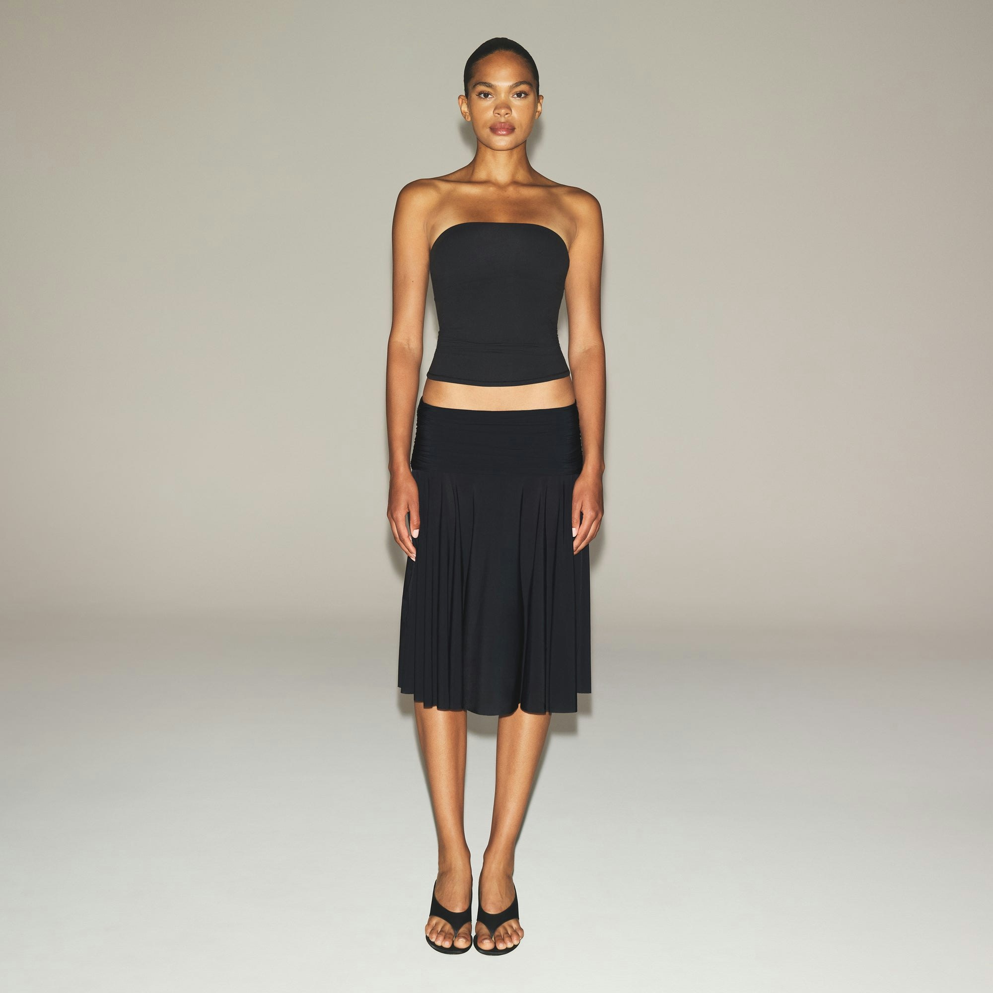 MILKY SHEER MIDI SKIRT | OBSIDIAN ON A MODEL FRONT VIEW | FOCUS: 0.0, 1.0, 0.9