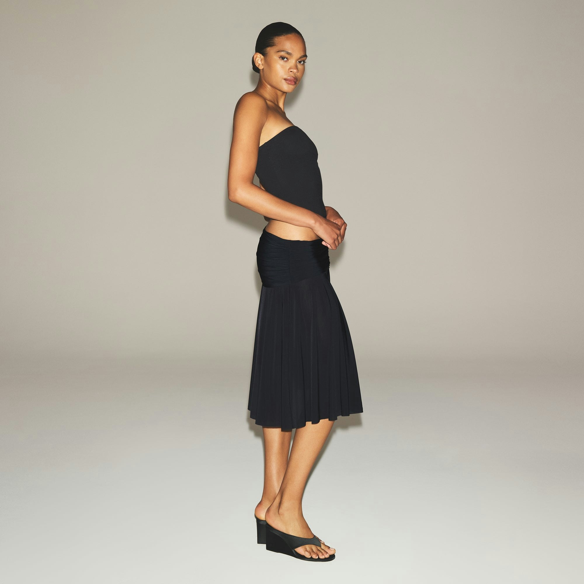 MILKY SHEER MIDI SKIRT | OBSIDIAN ON A MODEL FRONT VIEW | FOCUS: 0.0, 1.0, 0.9