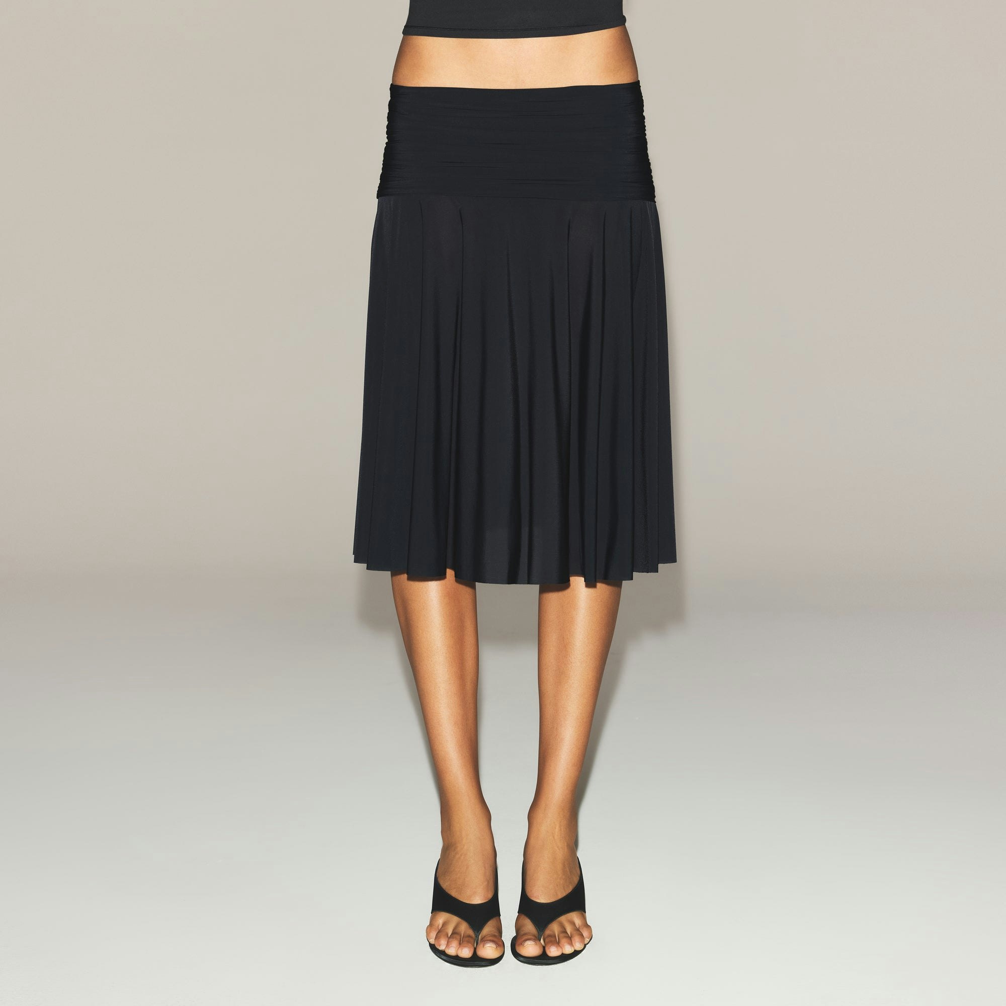 MILKY SHEER MIDI SKIRT | OBSIDIAN ON A MODEL SIDE VIEW | FOCUS: 0.0, 1.0, 0.9