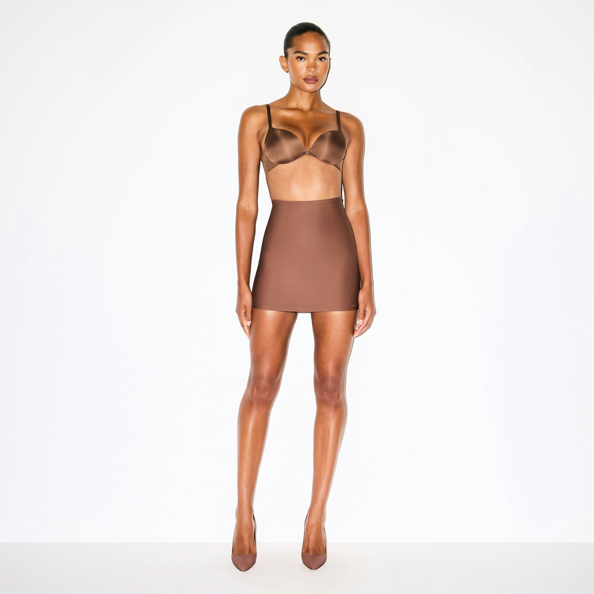 SKIMS BODY CORE SCULPT SKORT | JASPER ON A MODEL FRONT VIEW @ | FOCUS: 0.0, 1.0, 0.9