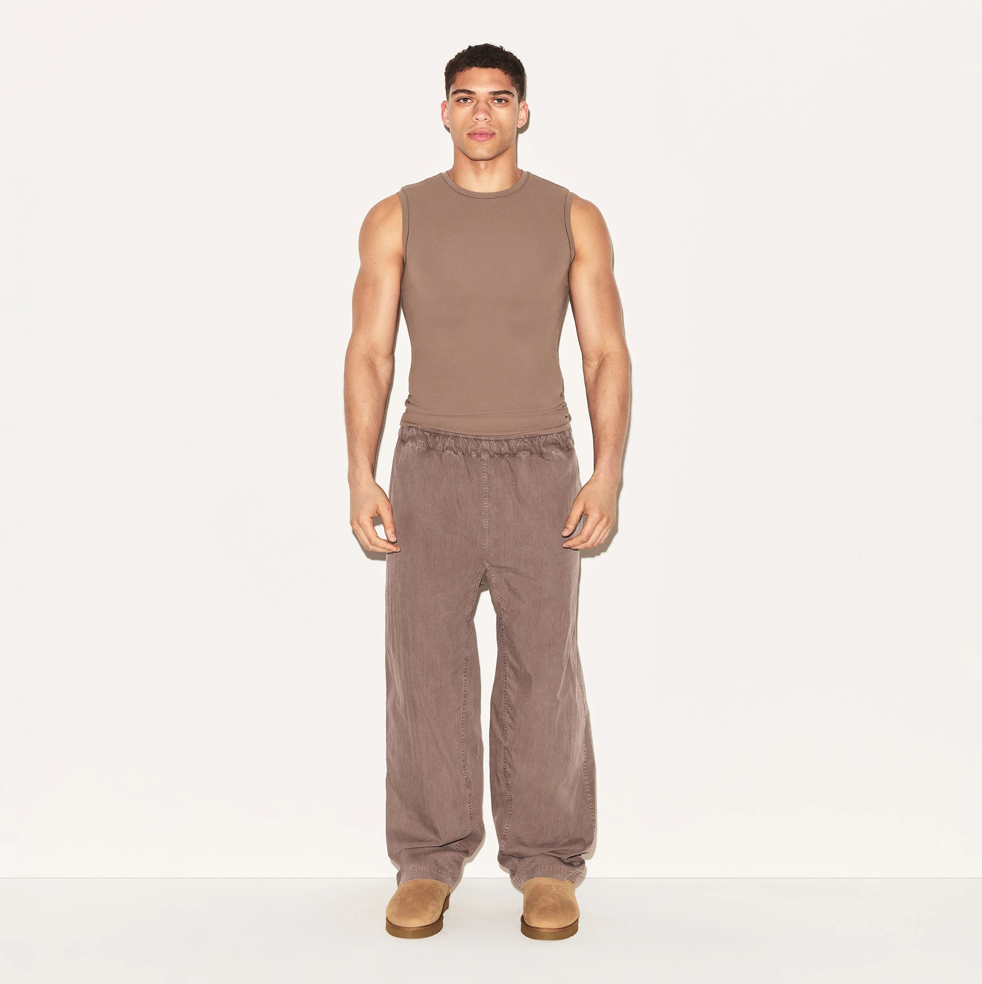 WOVEN MENS KARATE PANT | UMBER ON A MODEL FRONT VIEW | FOCUS: 0.0, 1.0, 0.9