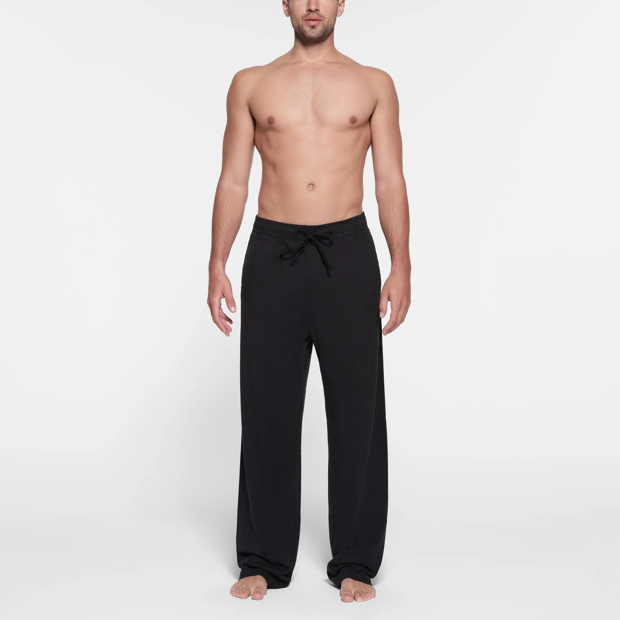 JERSEY LOUNGE MENS RELAXED STRAIGHT LEG PANT | OBSIDIAN ON A MODEL FRONT VIEW @ | FOCUS: 0.9, 0.1, 0.7
