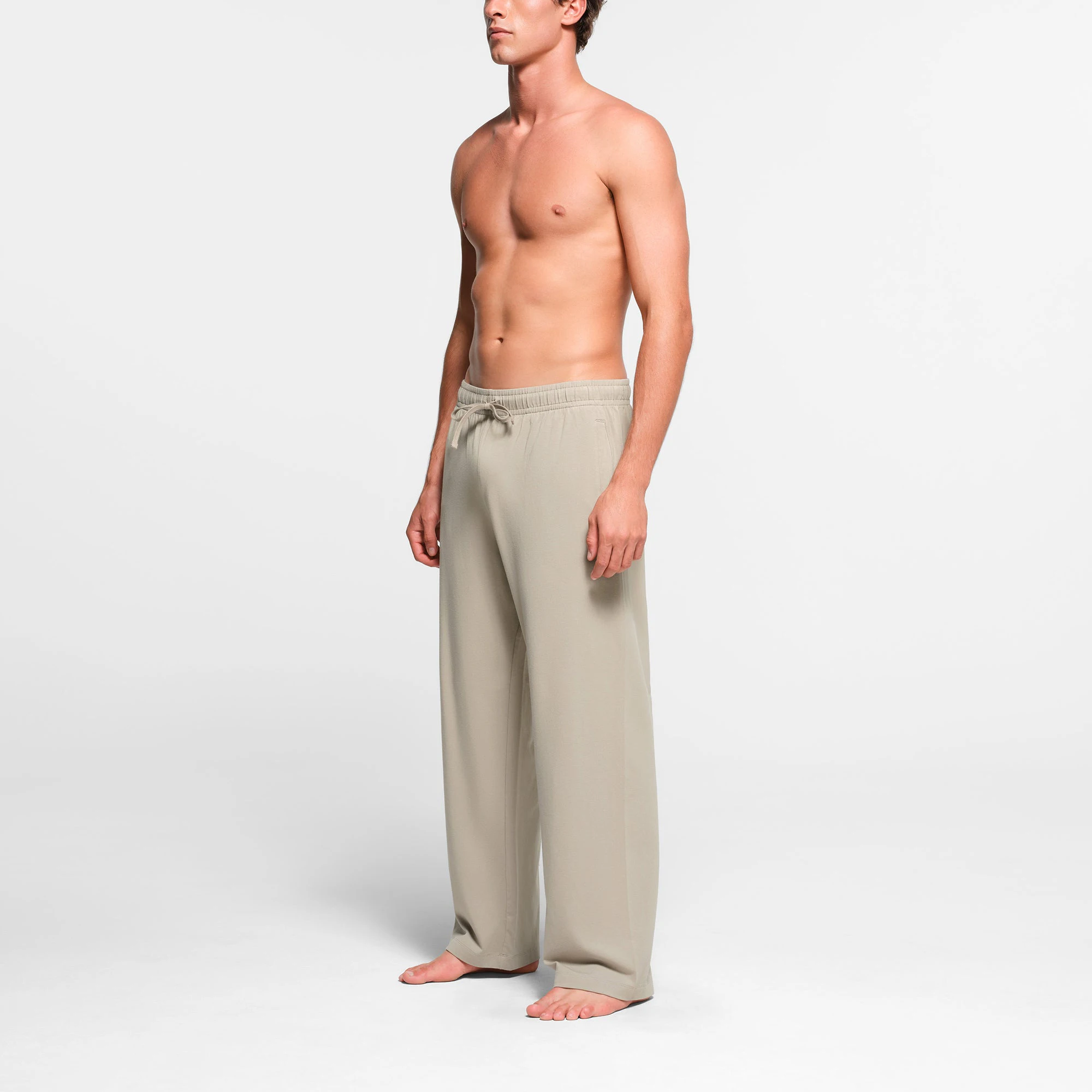 JERSEY LOUNGE MENS RELAXED STRAIGHT LEG PANT | SHALE ON A MODEL SIDE VIEW