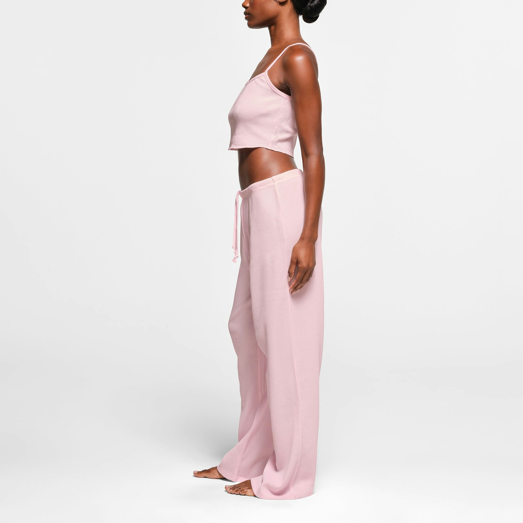 WAFFLE LOOSE PANT | CHERRY BLOSSOM ON A MODEL SIDE VIEW