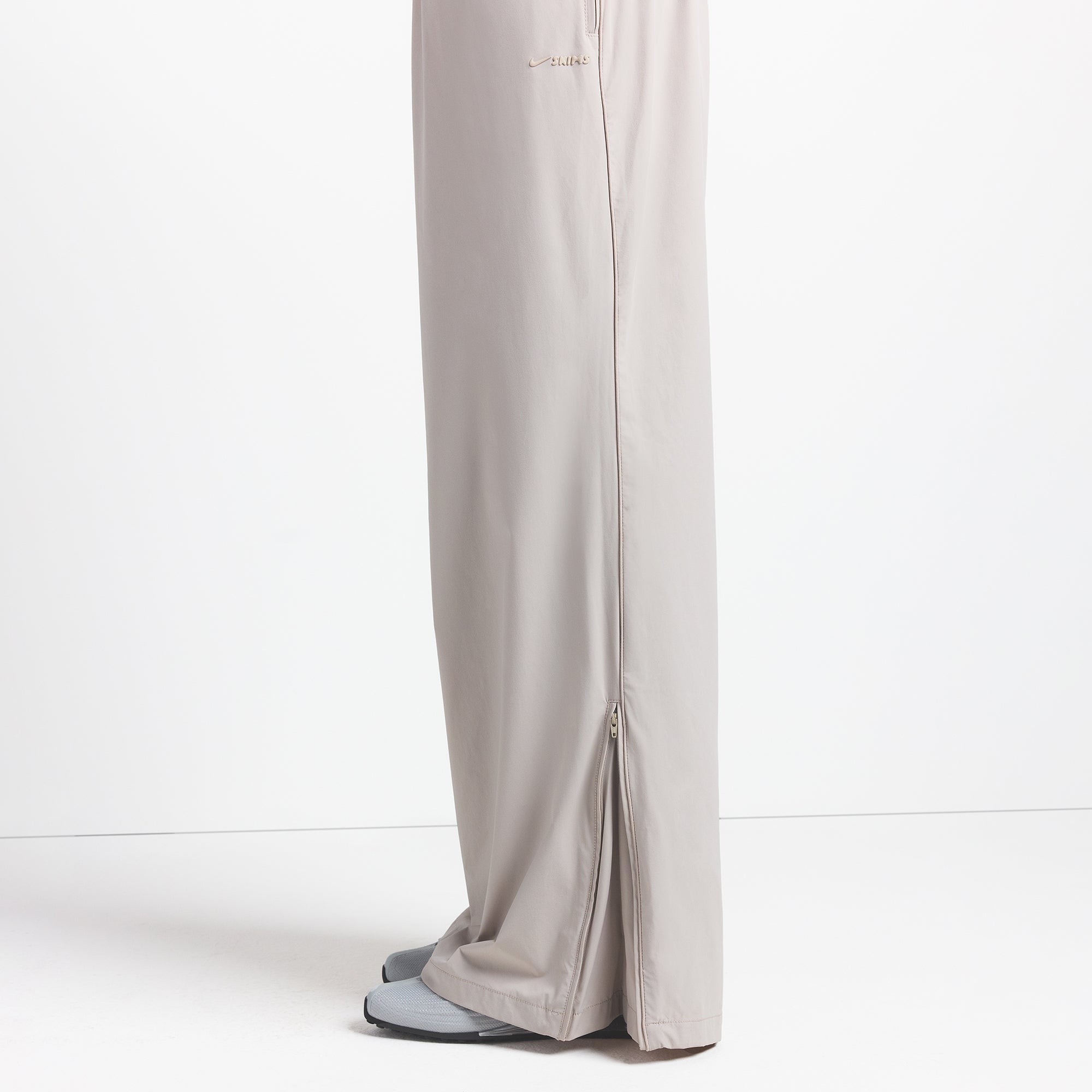 NikeSKIMS WOVEN NYLON OVERSIZED TRACK PANT | STONE | SKIMS