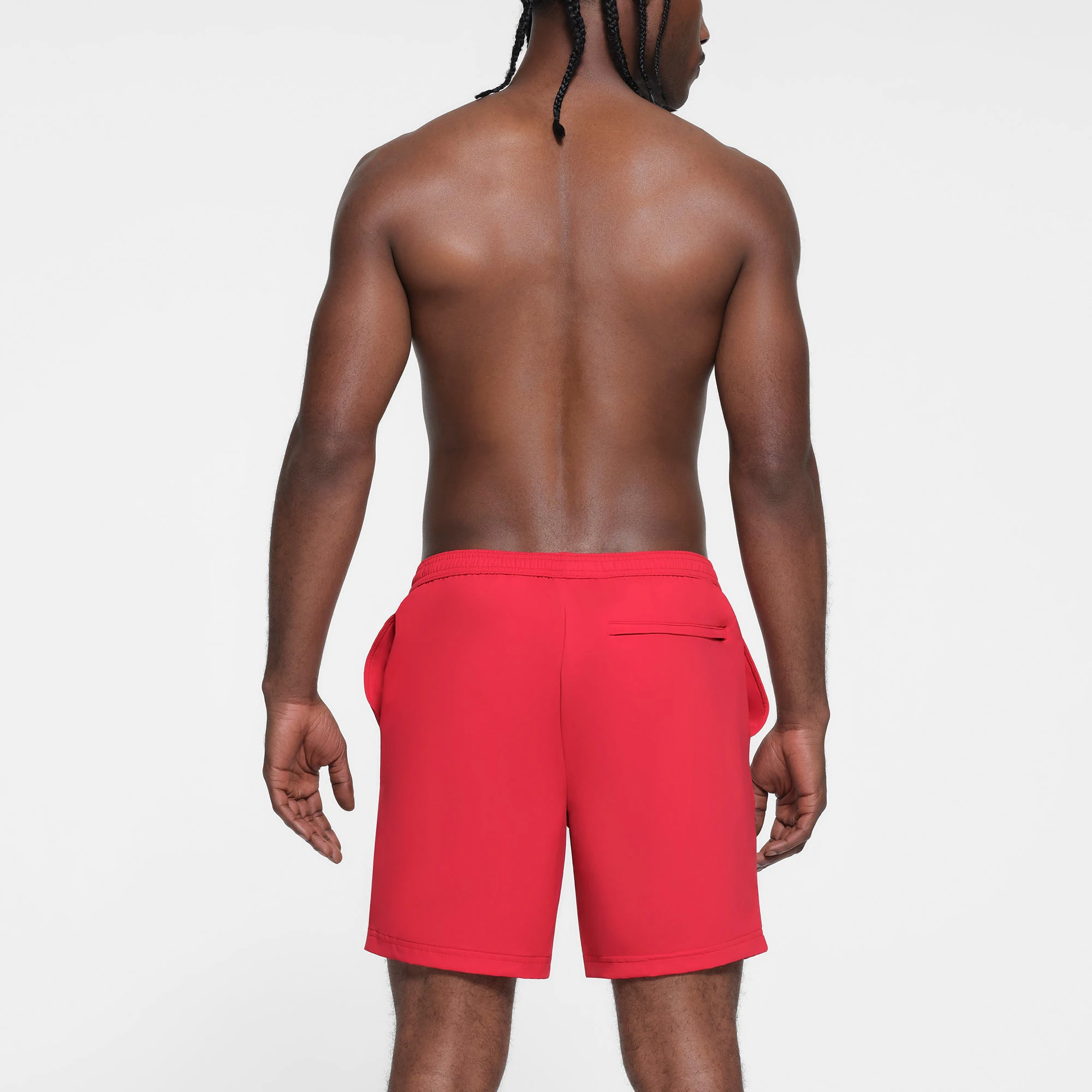 SKIMS FOR TEAM USA MENS OLYMPIC SWIM TRUNK | RED ON A MODEL BACK VIEW