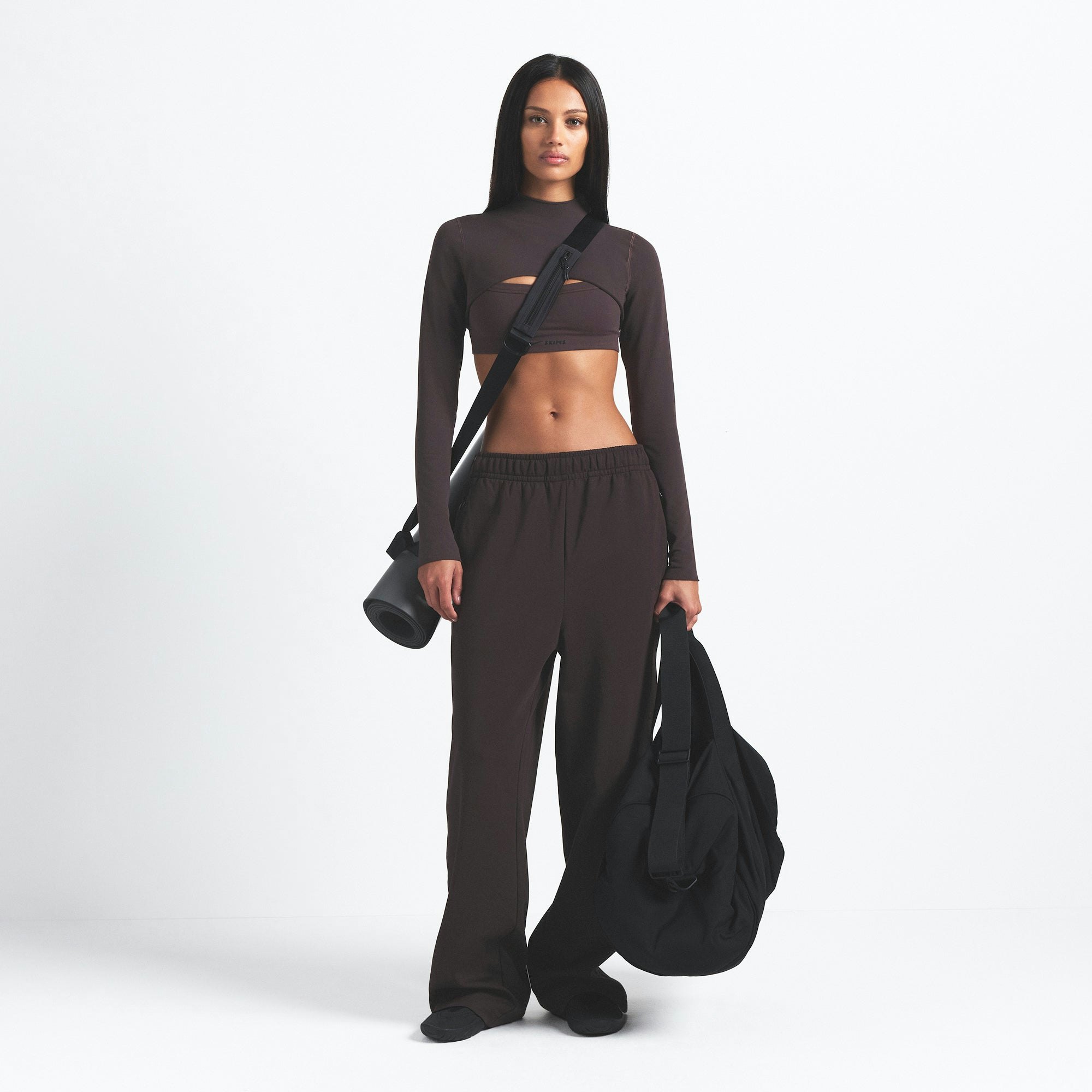NikeSKIMS MATTE TRICOT SIDE SNAPS PANT | DARK ROAST ON A MODEL FRONT VIEW @ | FOCUS: 0.0, 1.0, 0.9
