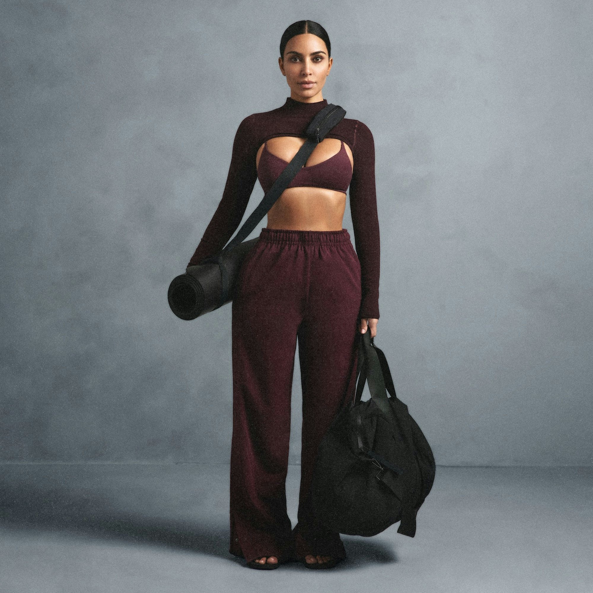 NikeSKIMS MATTE TRICOT SIDE SNAPS PANT | CURRANT ON A MODEL SIDE VIEW @ | FOCUS: 0.0, 1.0, 0.9