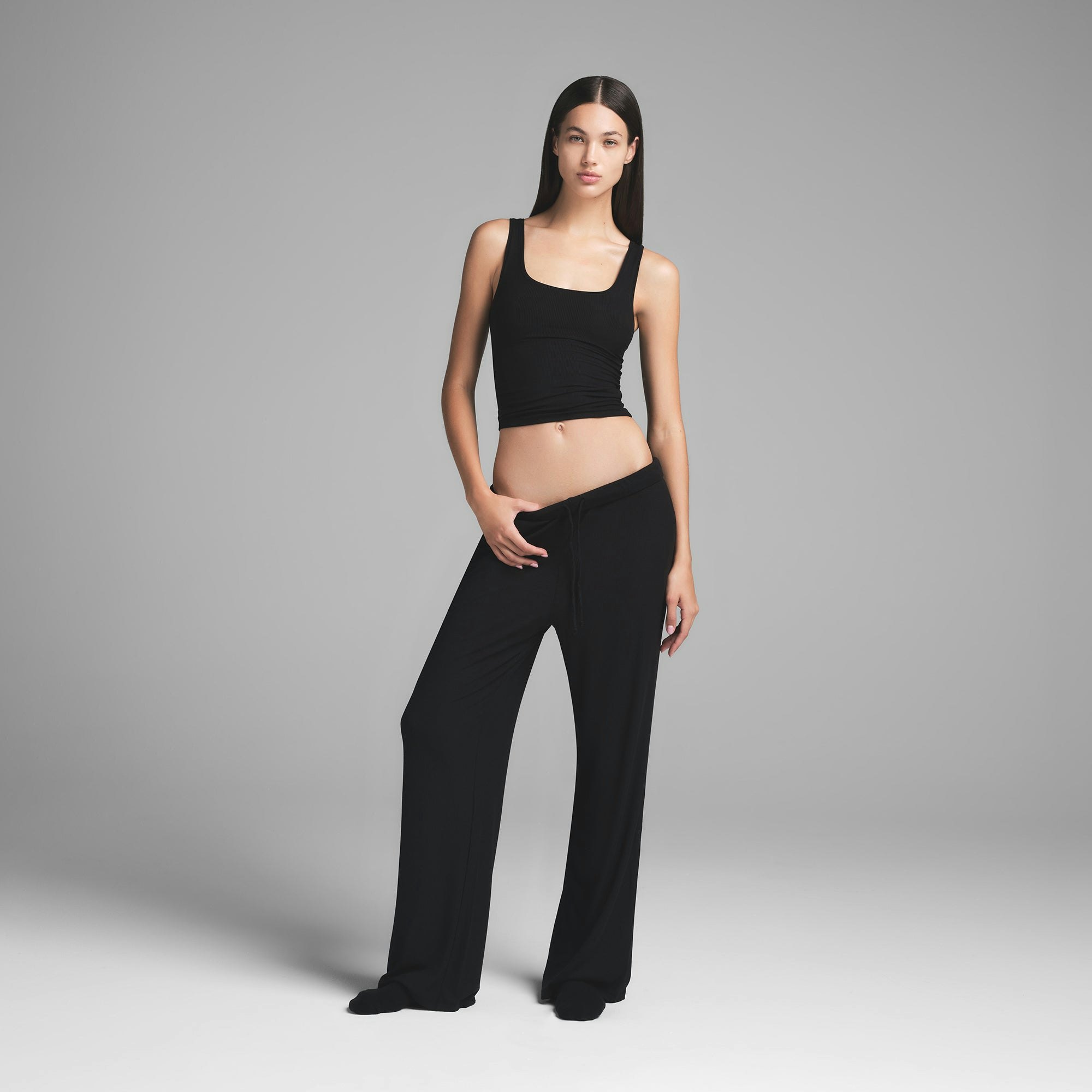 SOFT LOUNGE LOOSE PANT | ONYX ON A MODEL FRONT VIEW | FOCUS: 0.0, 1.0, 0.9