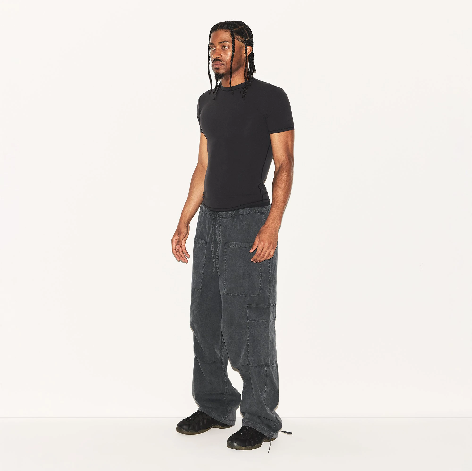 WOVEN MENS CARGO PANT | ASH ON A MODEL SIDE VIEW | FOCUS: 0.0, 1.0, 0.9