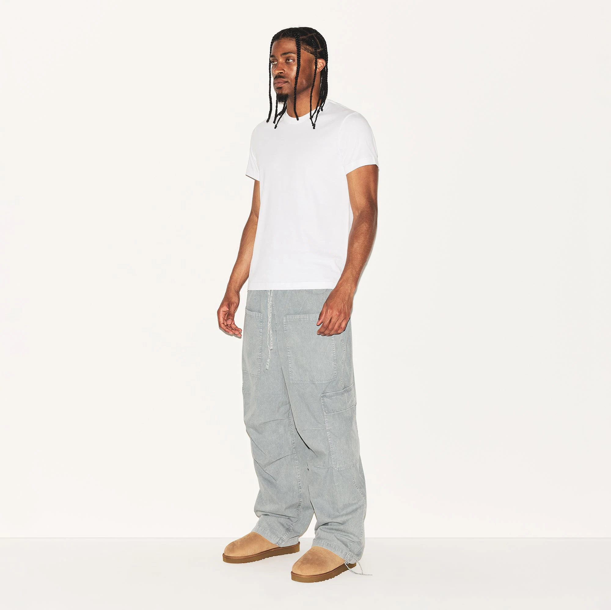 WOVEN MENS CARGO PANT | PACIFIC ON A MODEL SIDE VIEW | FOCUS: 0.0, 1.0, 0.9