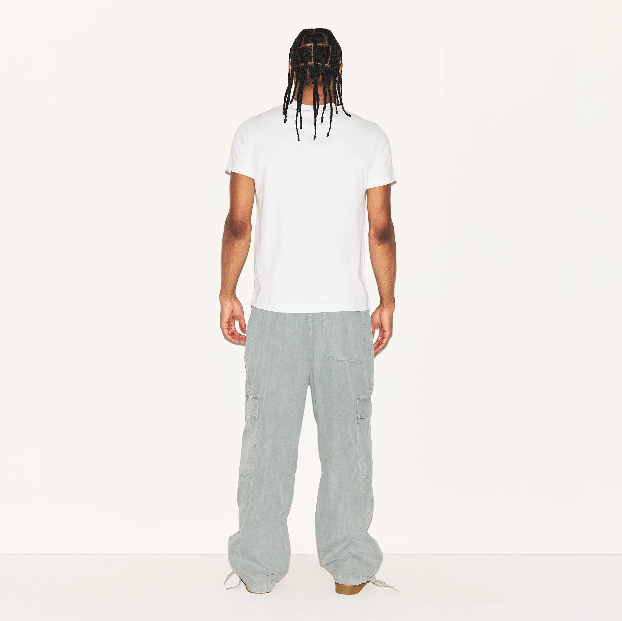 WOVEN MENS CARGO PANT | PACIFIC ON A MODEL BACK VIEW | FOCUS: 0.0, 1.0, 0.9