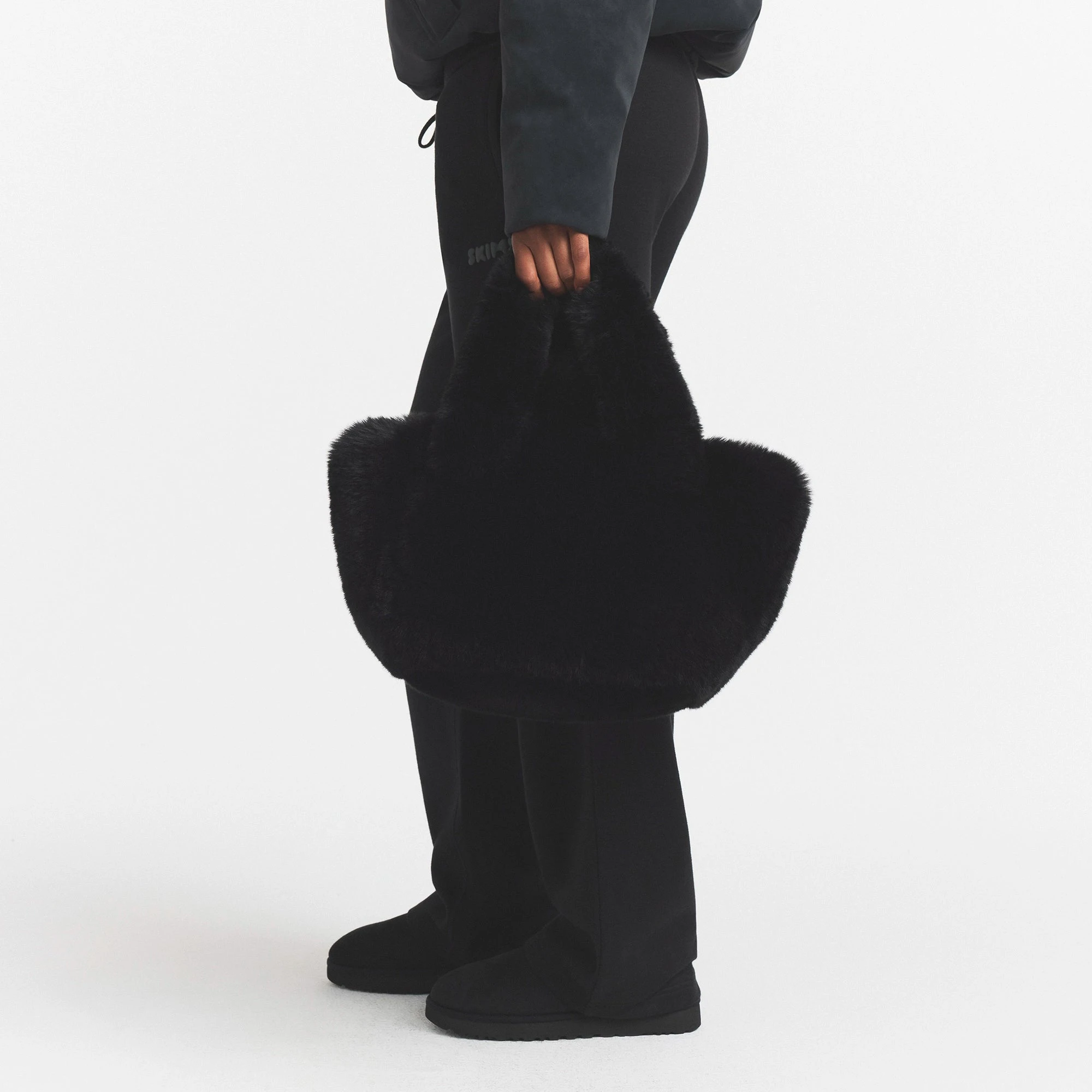 FAUX FUR SMALL TOTE | ONYX & LAYS FLAT ON A WHITE BACKGROUND | FLT