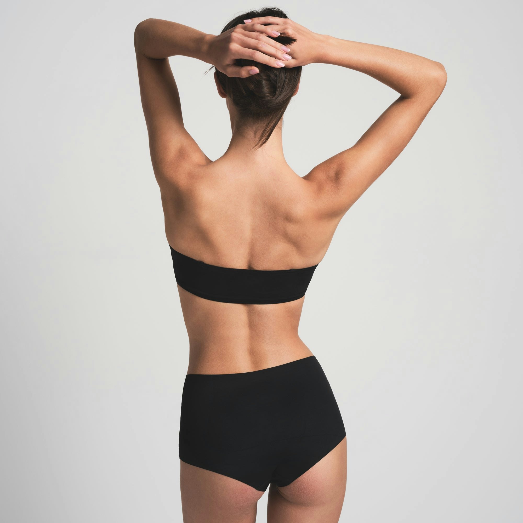 NAKED BANDEAU | ONYX ON A MODEL FRONT VIEW