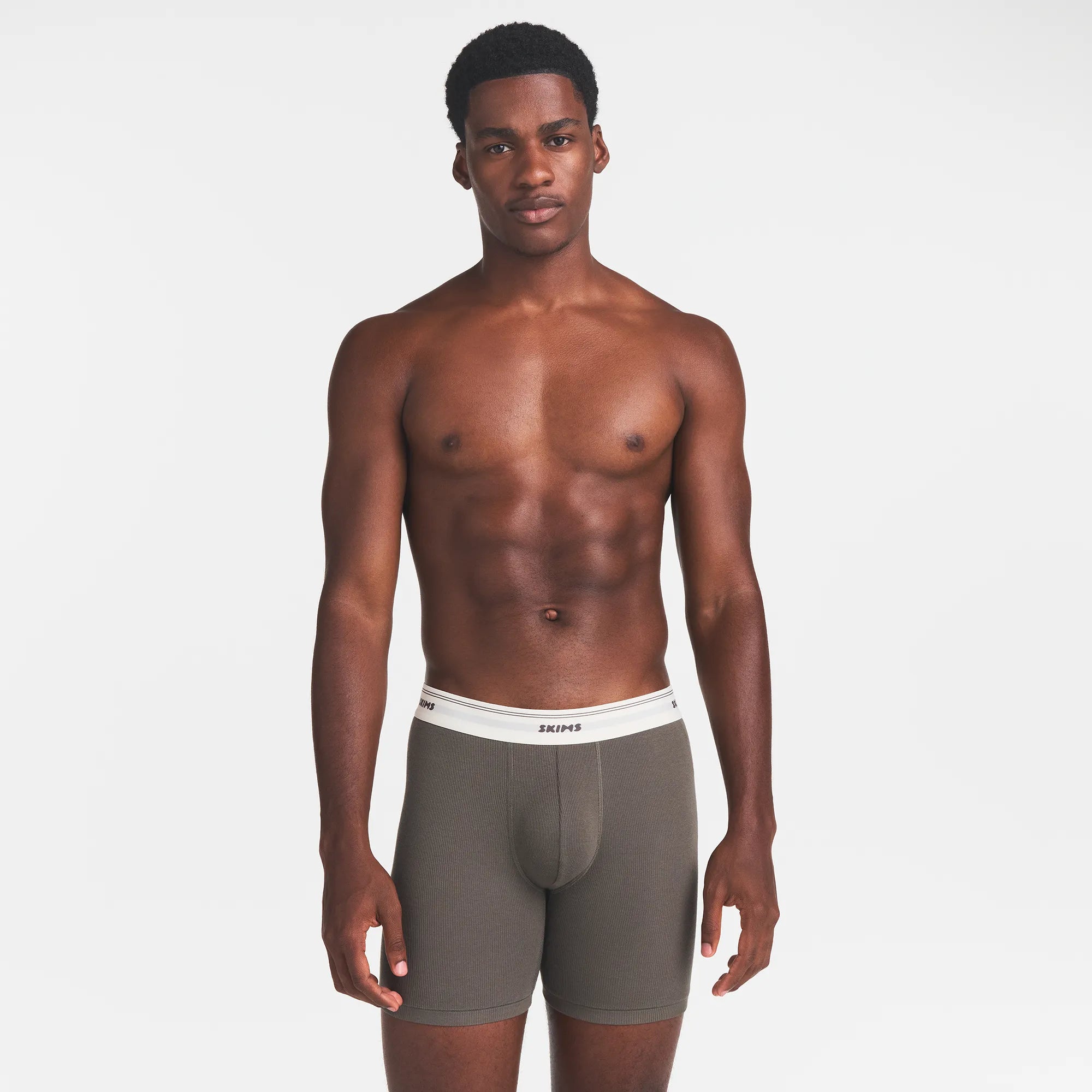 SKIMS COTTON RIB MENS 5" BOXER BRIEF | JUNGLE ON A MODEL FRONT VIEW
