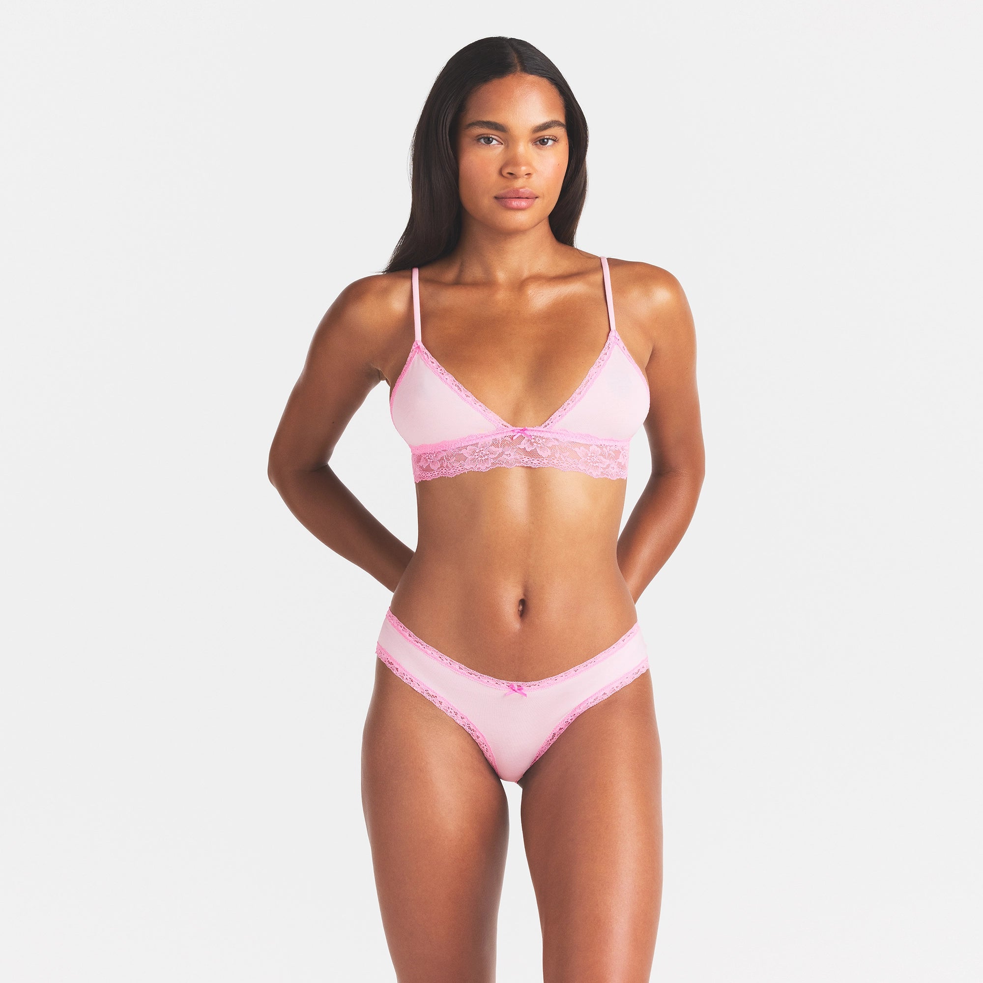 LIGHTWEIGHT COTTON LACE BRIEF | CHERRY BLOSSOM ON A MODEL FRONT VIEW