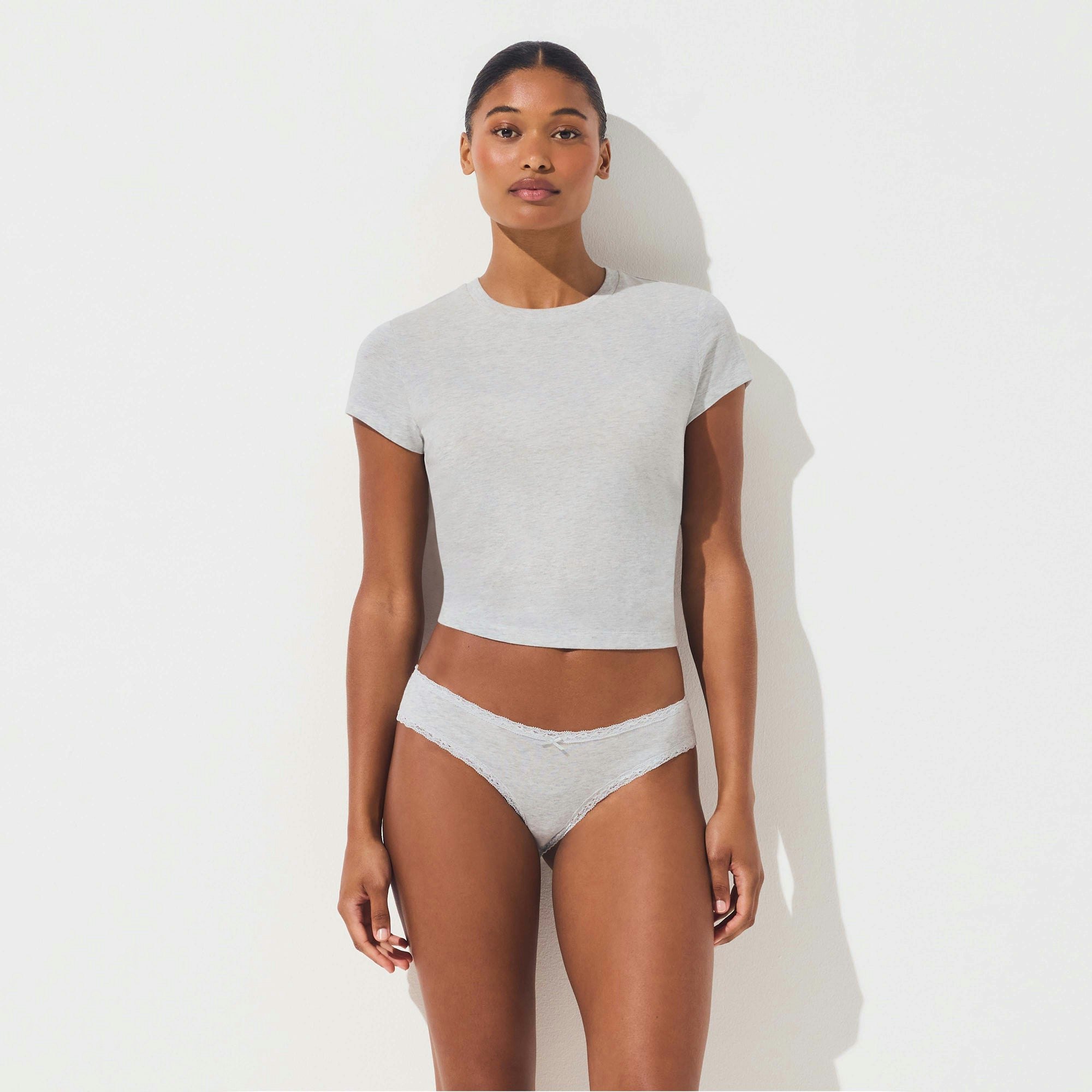 LIGHTWEIGHT COTTON LACE BRIEF | LIGHT HEATHER GREY ON A MODEL SIDE VIEW @ | FOCUS: 0.0, 1.0, 0.9