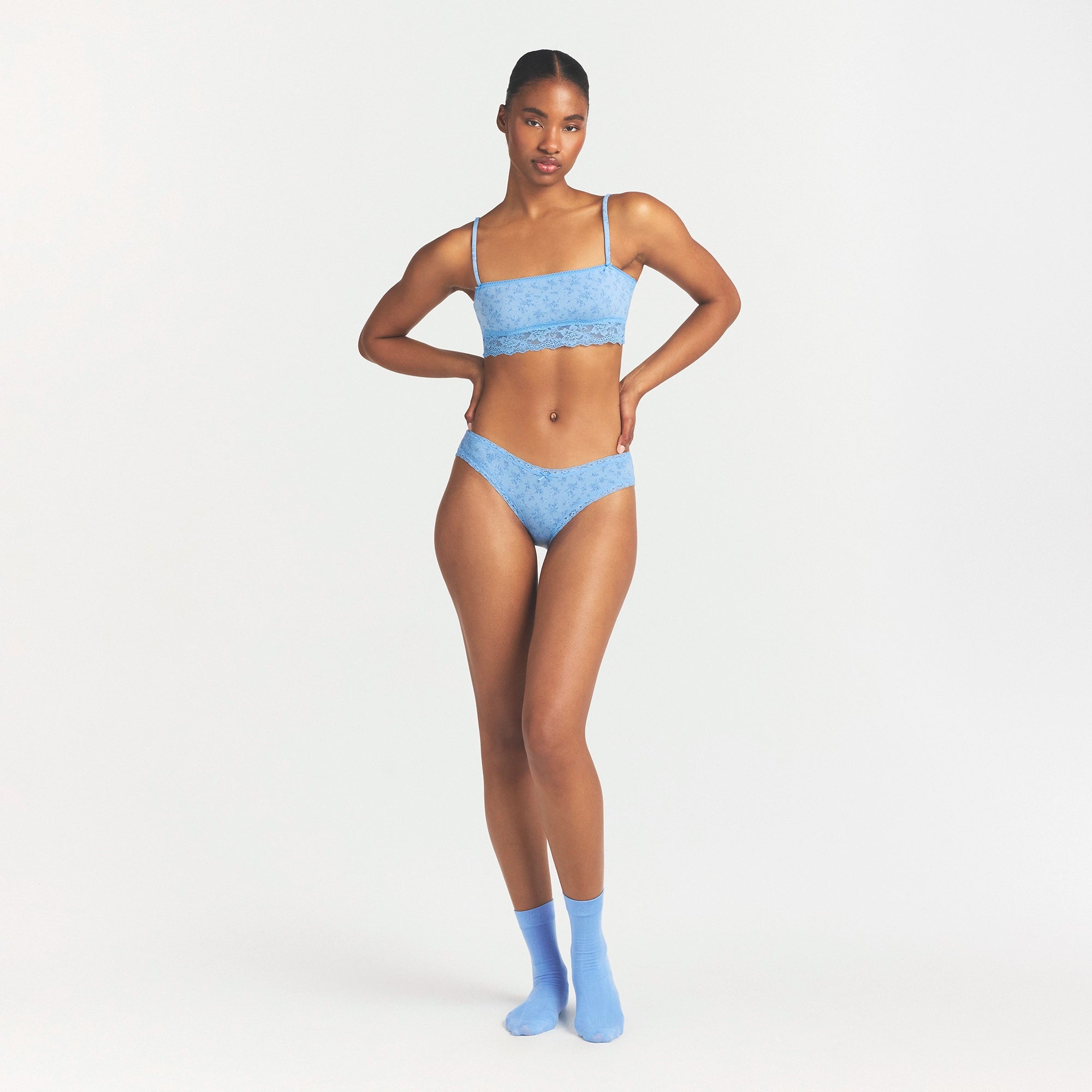 LIGHTWEIGHT COTTON LACE BRIEF | SURF DAINTY FLORAL PRINT ON A MODEL FRONT VIEW @ | FOCUS: 0.0, 1.0, 0.9