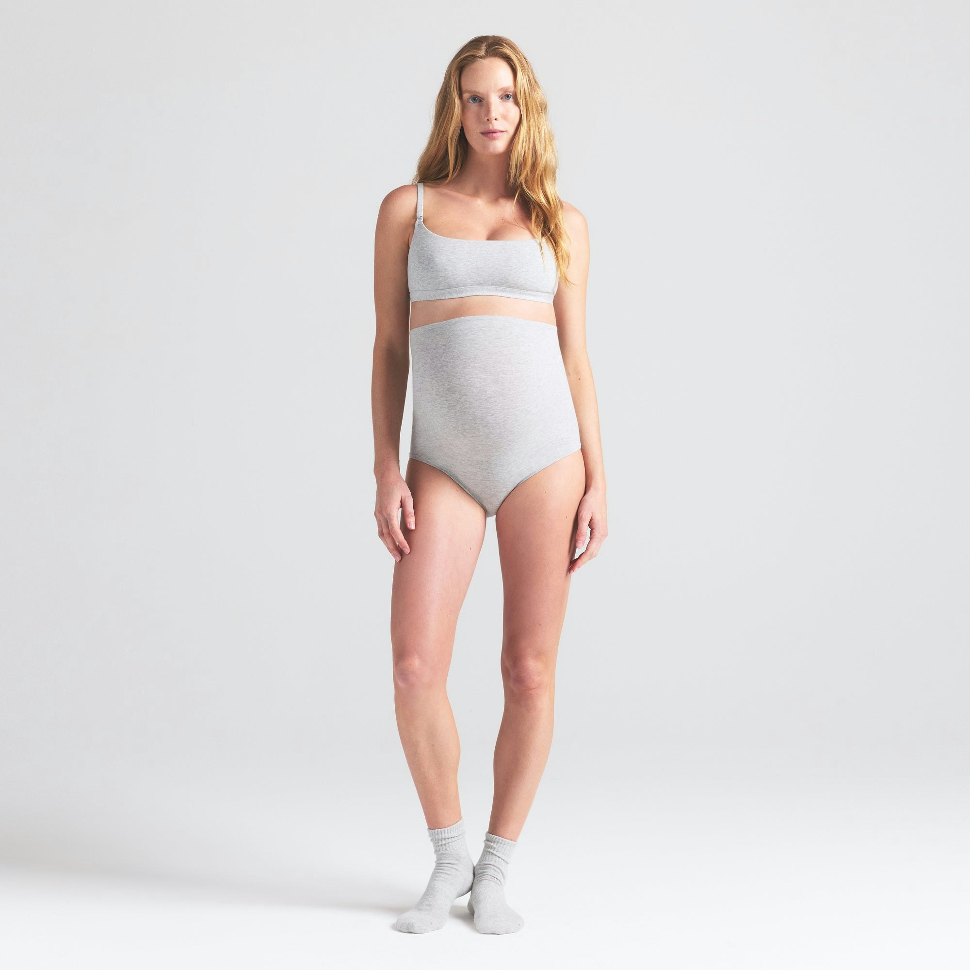 COTTON JERSEY MATERNITY HIGH-WAISTED BRIEF | LIGHT HEATHER GREY ON A MODEL FRONT VIEW | FOCUS: 0.0, 1.0, 0.9
