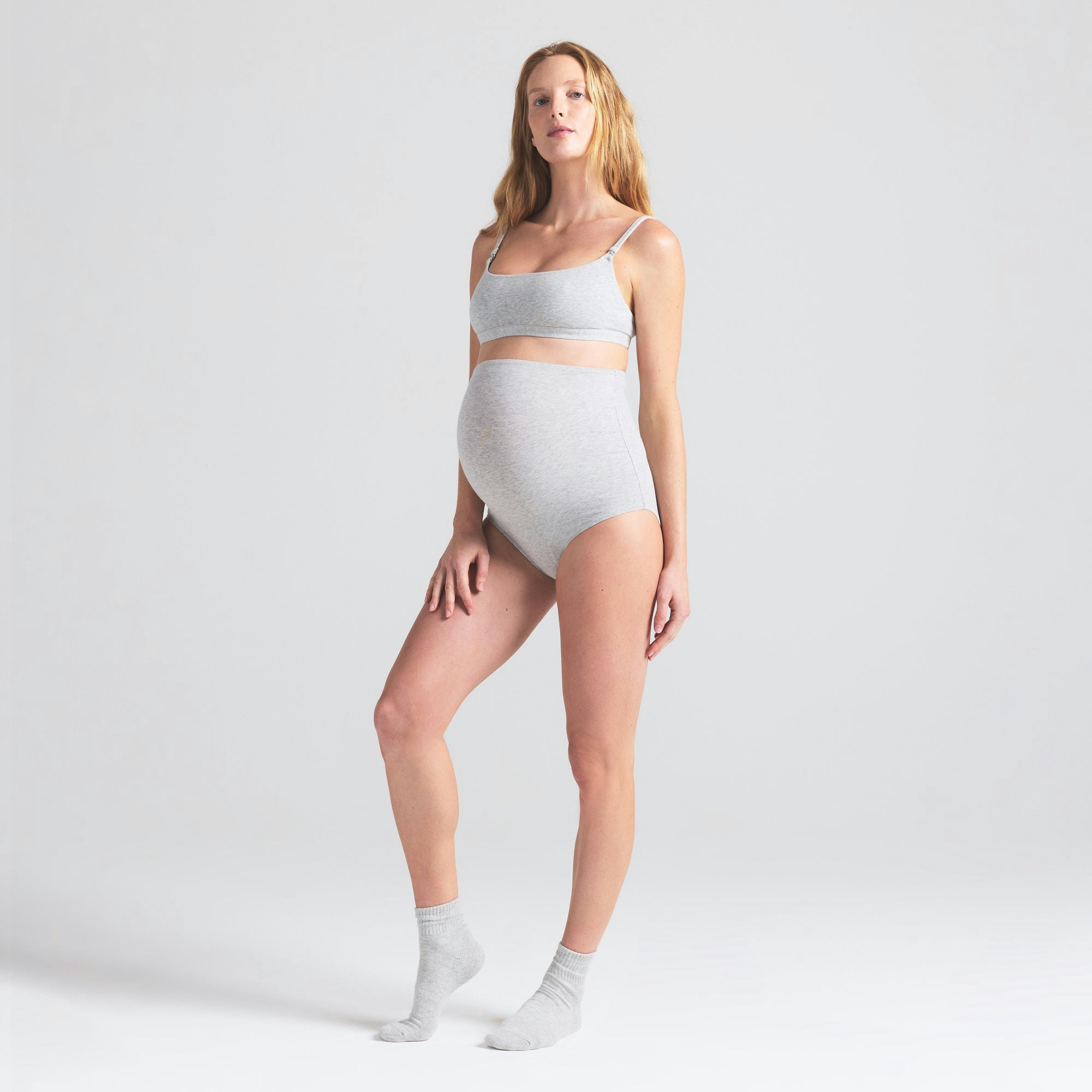 COTTON JERSEY MATERNITY HIGH-WAISTED BRIEF | LIGHT HEATHER GREY ON A MODEL FRONT VIEW | FOCUS: 0.0, 1.0, 0.9