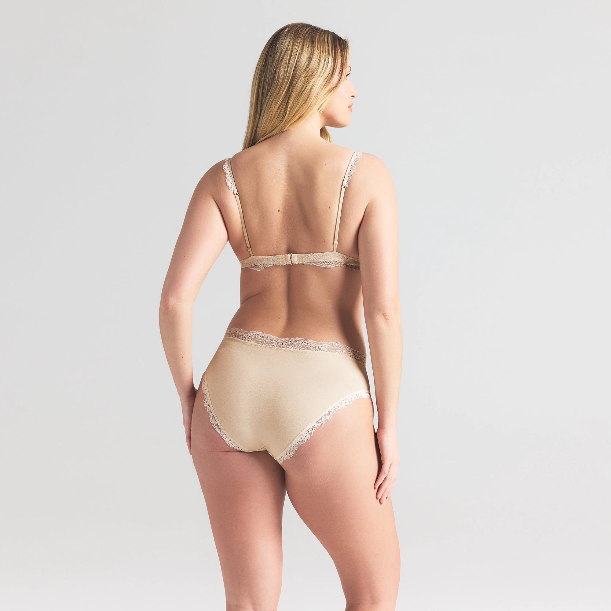 COTTON JERSEY LACE BRIEF | BUTTER ON A MODEL SIDE VIEW | FOCUS: 0.0, 1.0, 0.9