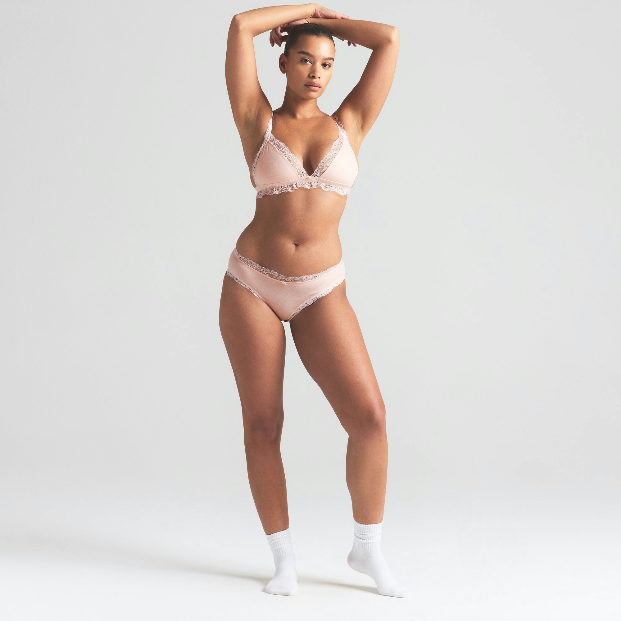 COTTON JERSEY LACE BRIEF | PRIMROSE ON A MODEL FRONT VIEW | FOCUS: 0.0, 1.0, 0.9