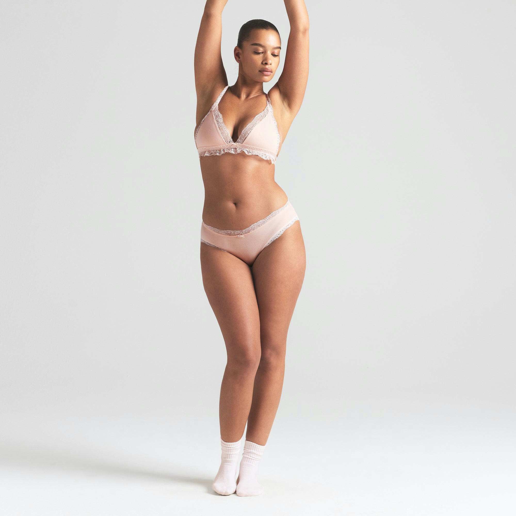 COTTON JERSEY LACE BRIEF | PRIMROSE ON A MODEL FRONT VIEW | FOCUS: 0.0, 1.0, 0.9