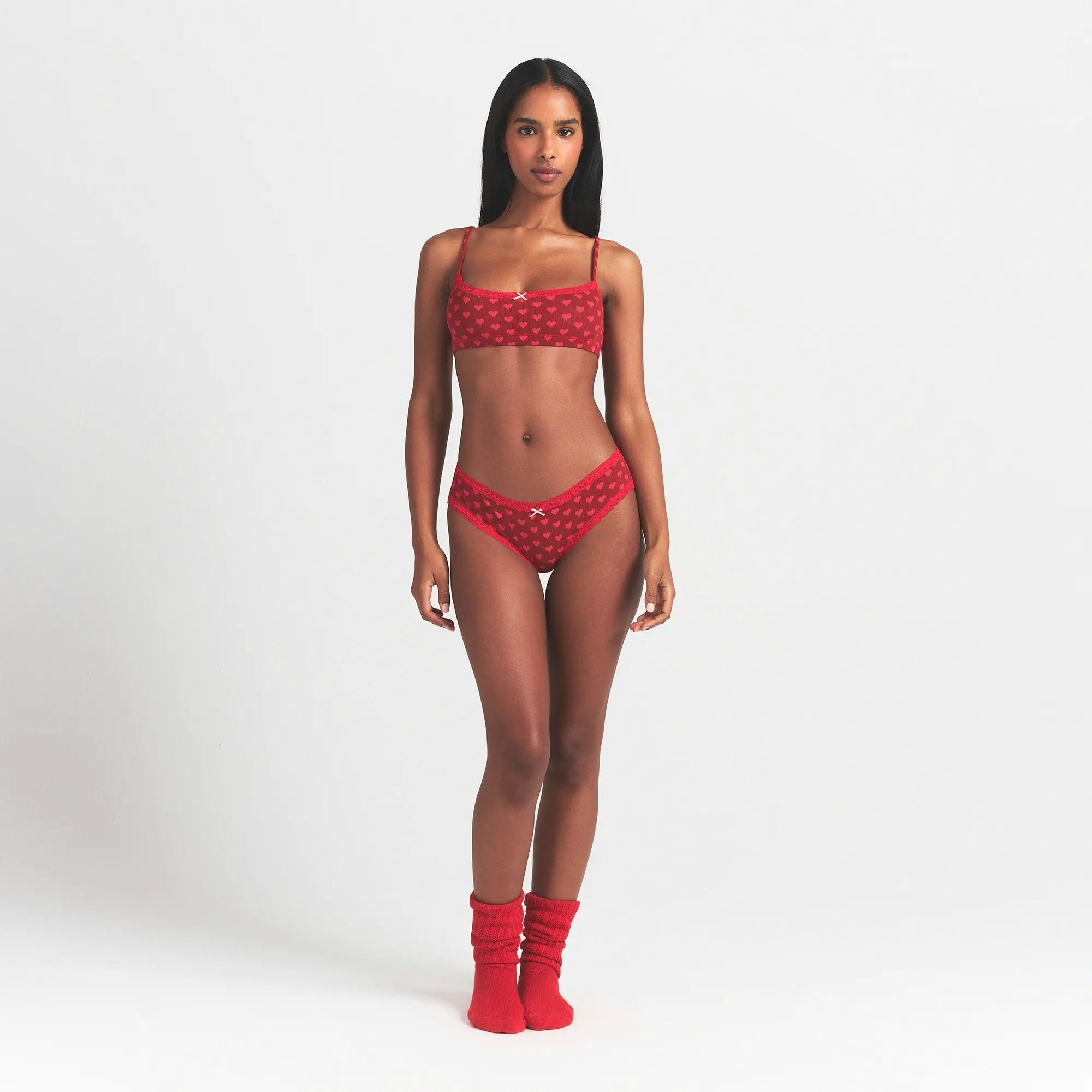 LIGHTWEIGHT COTTON POINTELLE LACE BRIEF | BRICK HEART HALFDROP ON A MODEL FRONT VIEW @ | FOCUS: 0.0, 1.0, 0.9