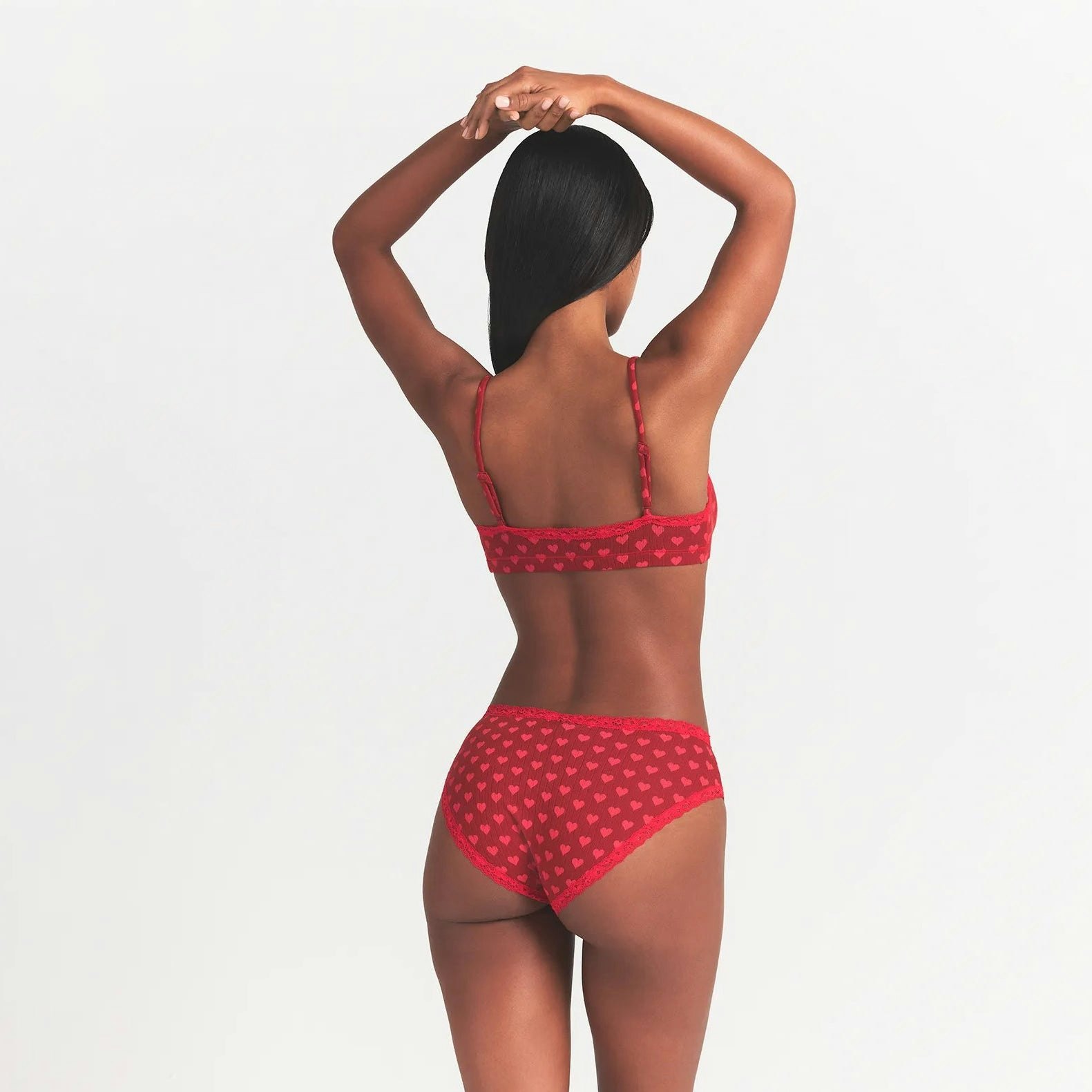 LIGHTWEIGHT COTTON POINTELLE LACE BRIEF | BRICK HEART HALFDROP ON A MODEL BACK VIEW @ | FOCUS: 0.0, 1.0, 0.9