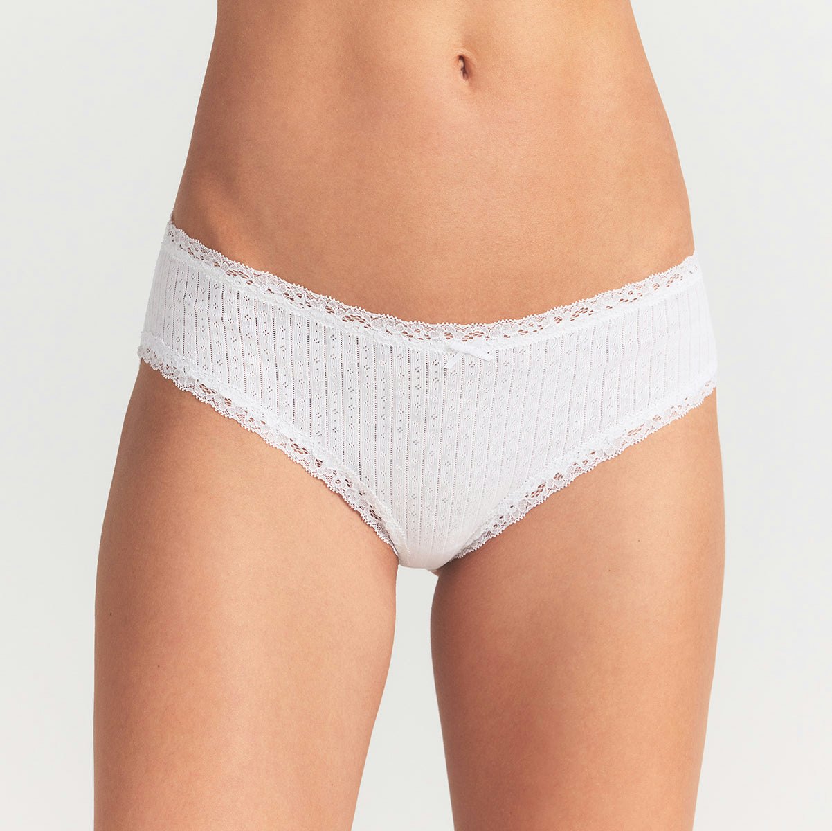 LIGHTWEIGHT COTTON POINTELLE LACE BRIEF | SNOW ON A MODEL FRONT VIEW @ | FOCUS: 0.0, 1.0, 0.9
