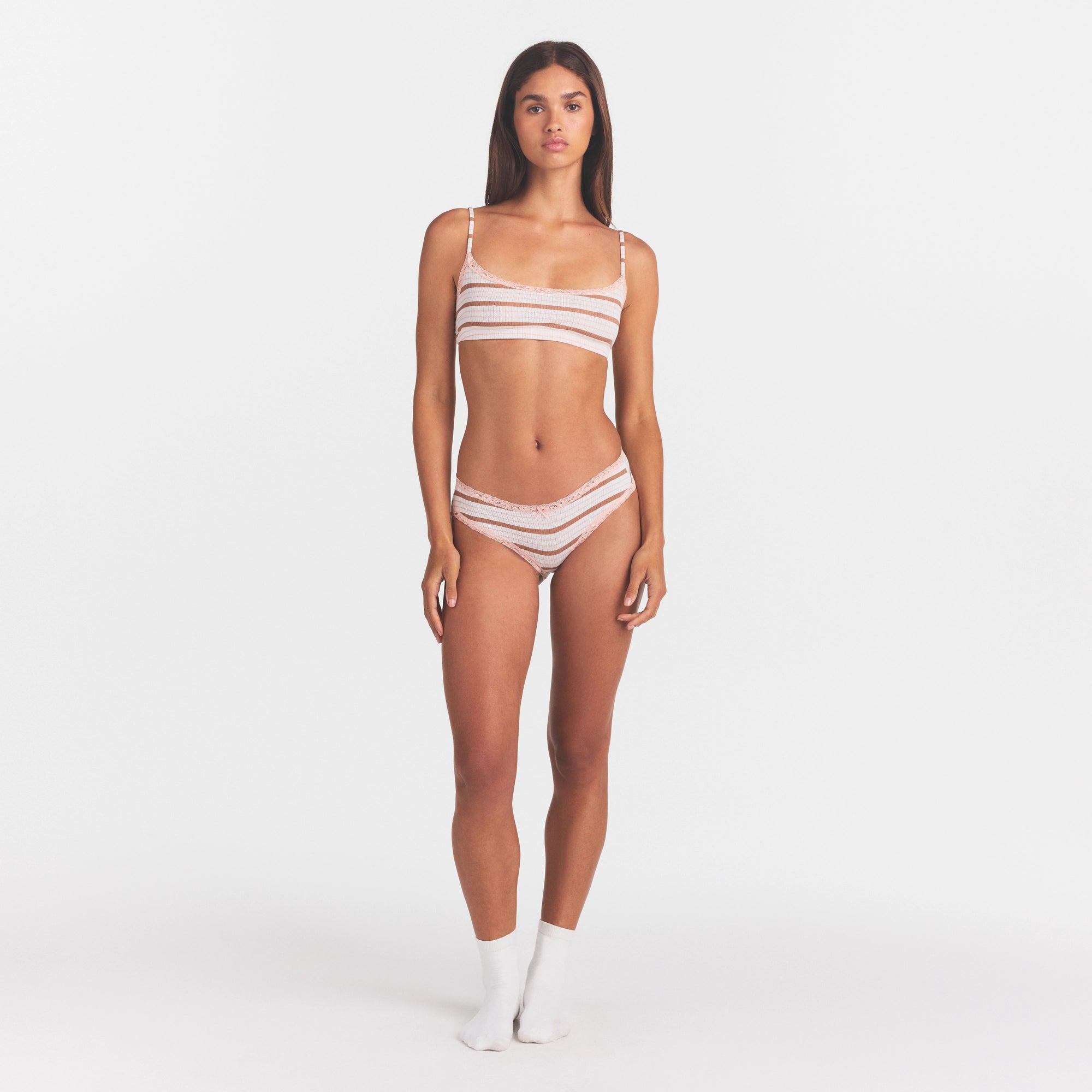 LIGHTWEIGHT COTTON POINTELLE LACE BRIEF | VILLA EGRET RUNWAY STRIPE ON A MODEL FRONT VIEW @ | FOCUS: 0.0, 1.0, 0.9
