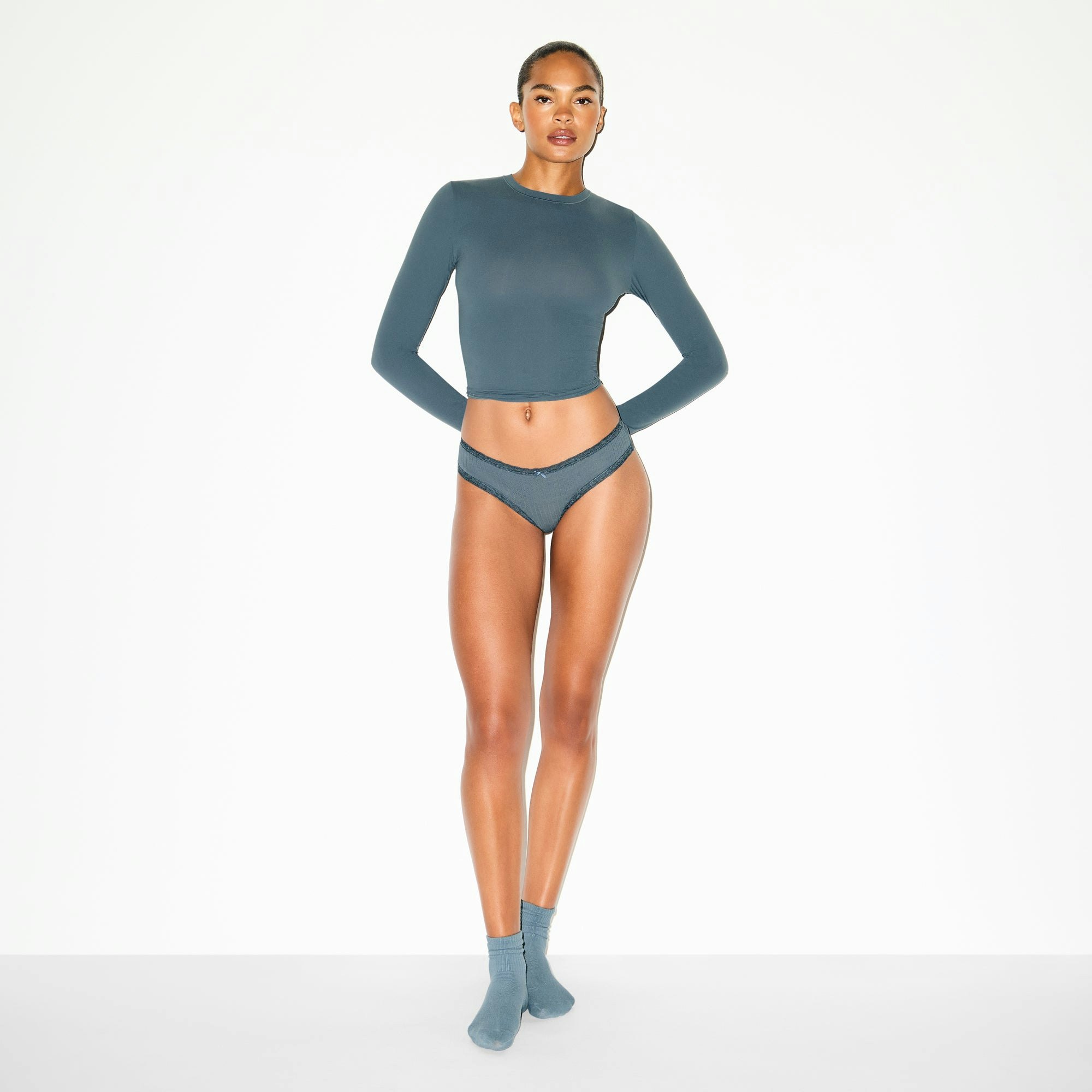 LIGHTWEIGHT COTTON POINTELLE LACE BRIEF | ZIRCON TONAL ON A MODEL FRONT VIEW @ | FOCUS: 0.0, 1.0, 0.9