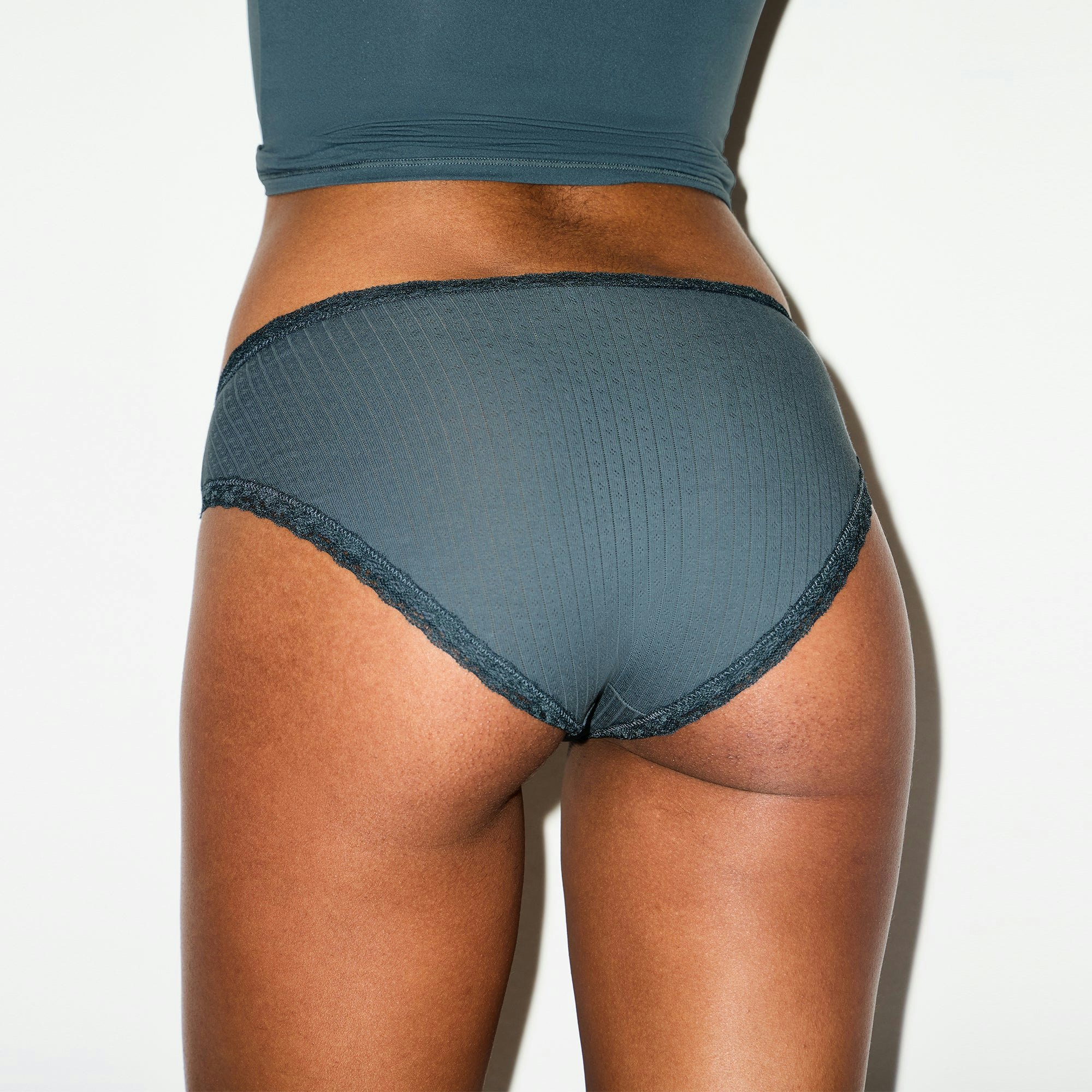 LIGHTWEIGHT COTTON POINTELLE LACE BRIEF | ZIRCON TONAL ON A MODEL SIDE VIEW @ | FOCUS: 0.0, 1.0, 0.9