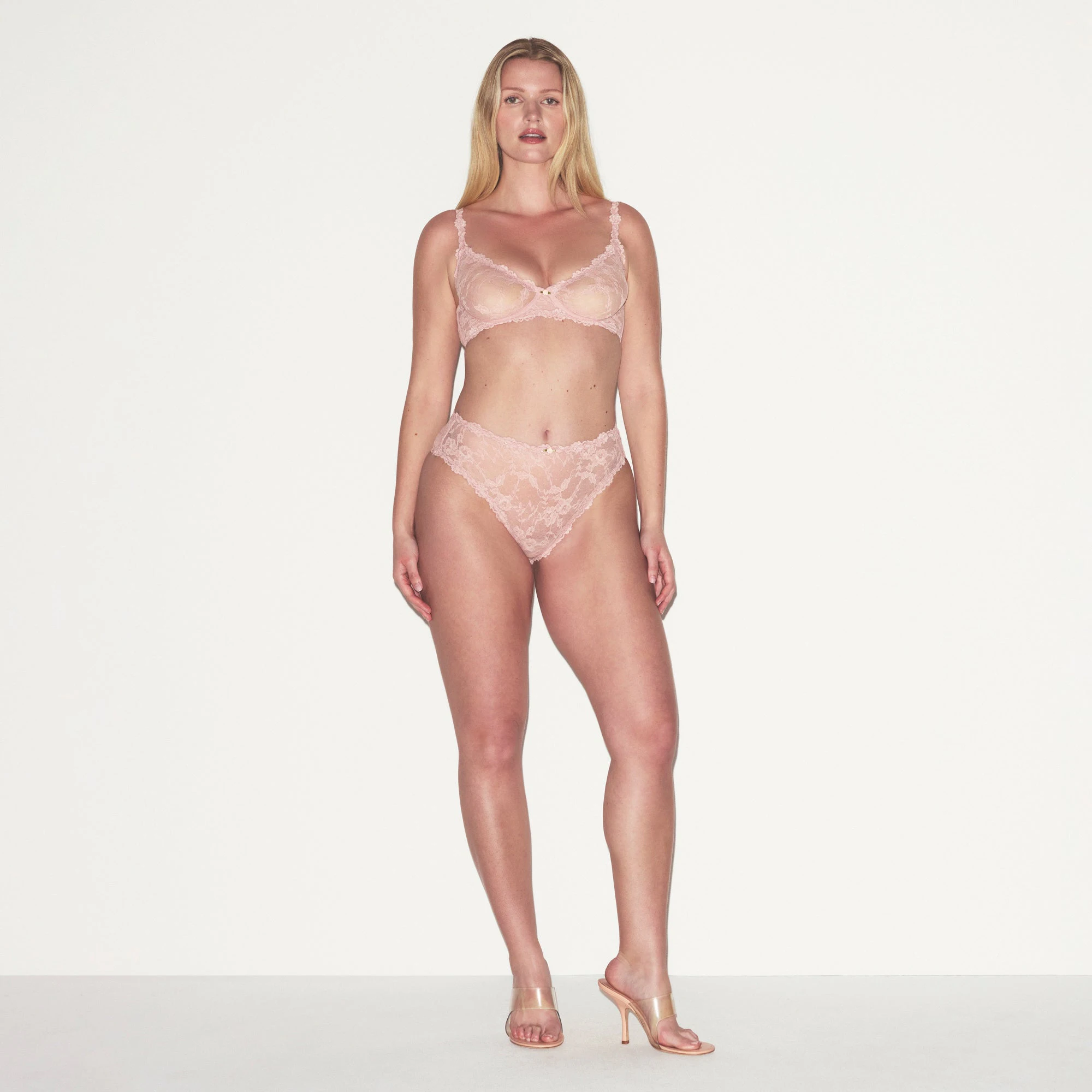 STRETCH LACE BRIEF | MORGANITE ON A MODEL FRONT VIEW @ | FOCUS: 0.0, 1.0, 0.9