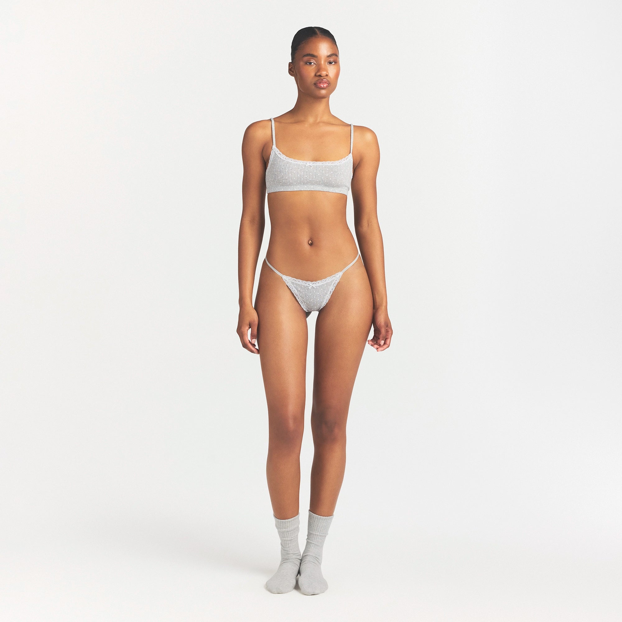 LIGHTWEIGHT COTTON POINTELLE SCOOP BRALETTE | LIGHT HEATHER GREY PIN DOT ON A MODEL FRONT VIEW @ | FOCUS: 0.0, 1.0, 0.9