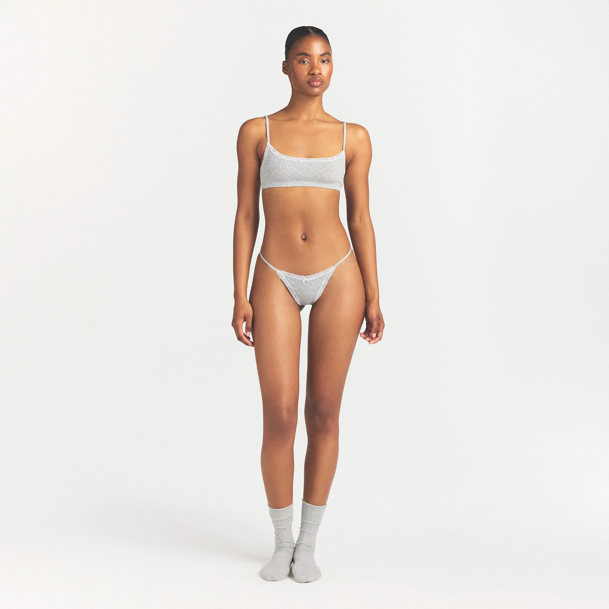 LIGHTWEIGHT COTTON POINTELLE SCOOP BRALETTE | LIGHT HEATHER GREY PIN DOT ON A MODEL FRONT VIEW @ | FOCUS: 0.0, 1.0, 0.9