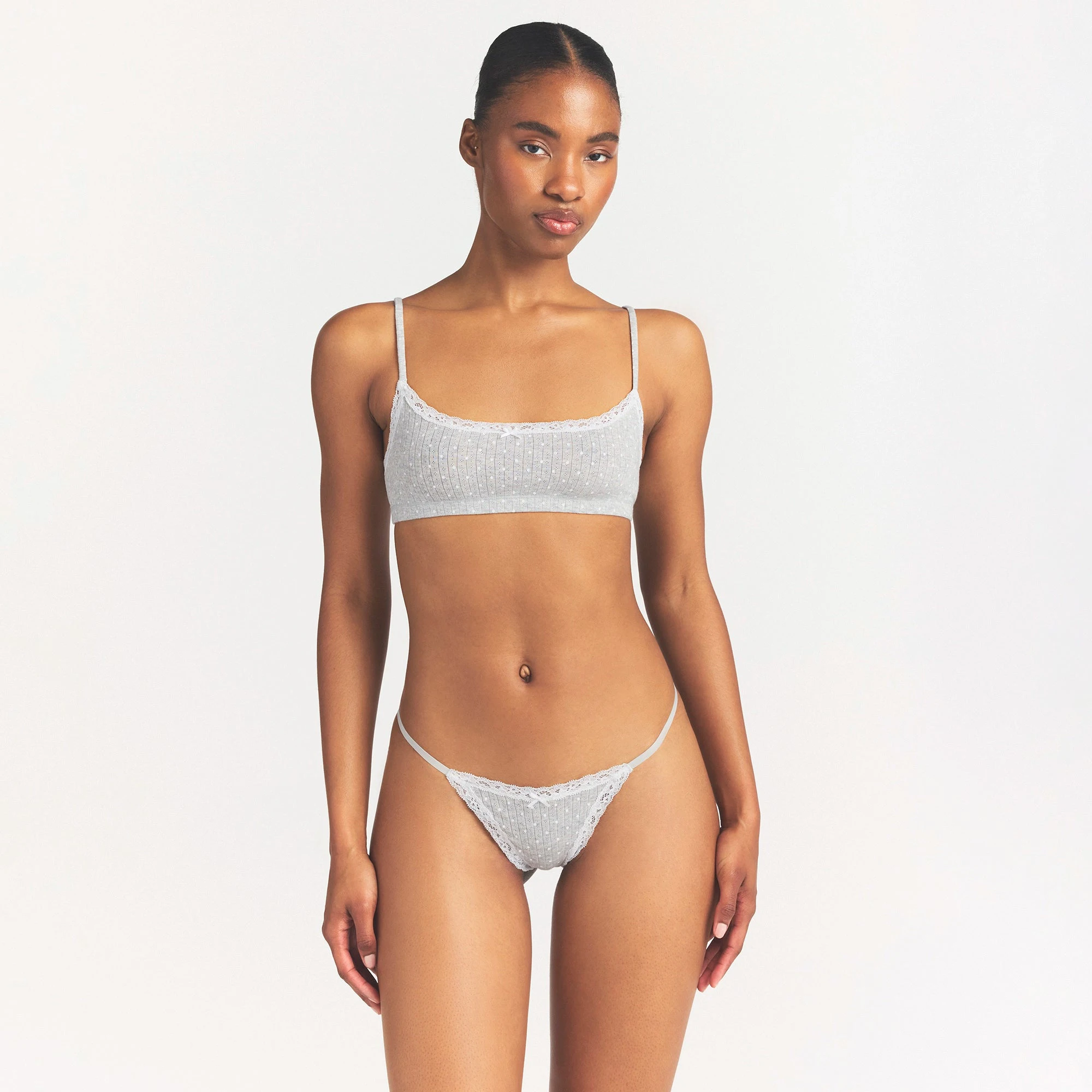 LIGHTWEIGHT COTTON POINTELLE SCOOP BRALETTE | LIGHT HEATHER GREY PIN DOT ON A MODEL SIDE VIEW @ | FOCUS: 0.0, 1.0, 0.9