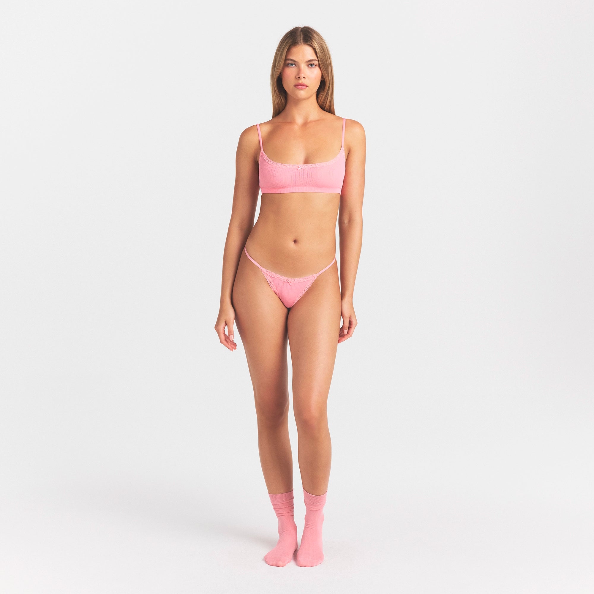 LIGHTWEIGHT COTTON POINTELLE SCOOP BRALETTE | MELON TONAL ON A MODEL FRONT VIEW @ | FOCUS: 0.0, 1.0, 0.9