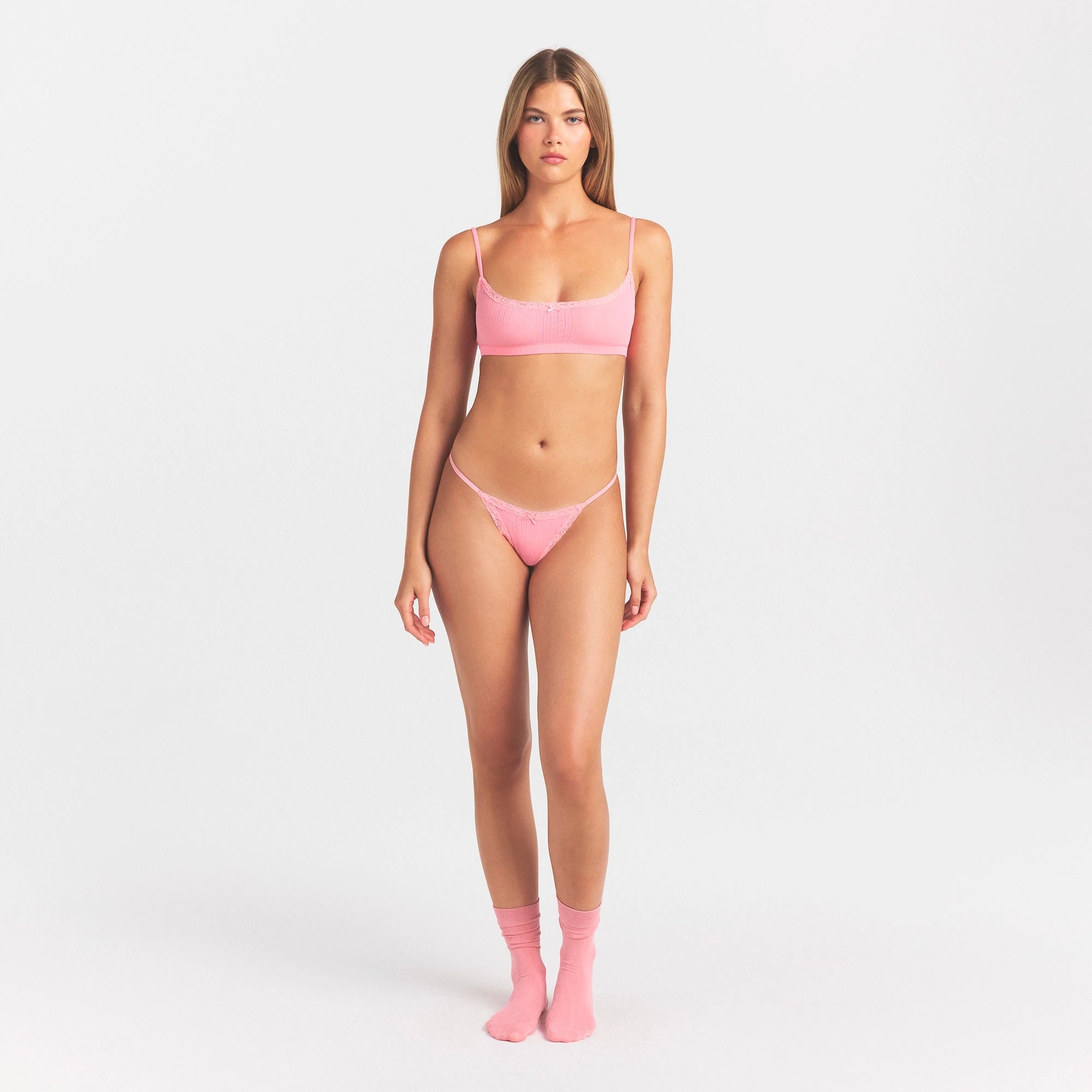 LIGHTWEIGHT COTTON POINTELLE SCOOP BRALETTE | MELON TONAL ON A MODEL FRONT VIEW @ | FOCUS: 0.0, 1.0, 0.9