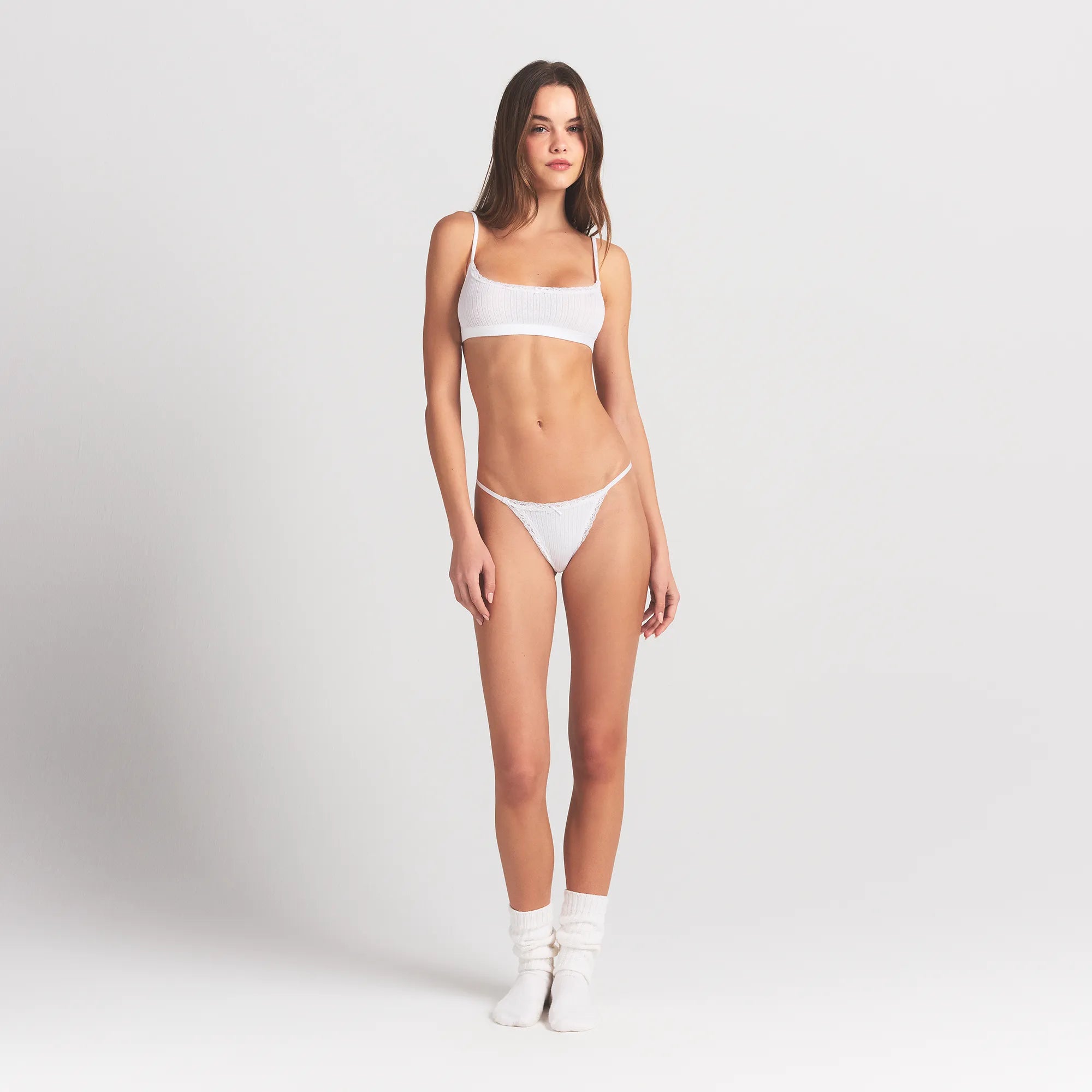 LIGHTWEIGHT COTTON POINTELLE SCOOP BRALETTE | SNOW ON A MODEL FRONT VIEW @ | FOCUS: 0.0, 1.0, 0.9